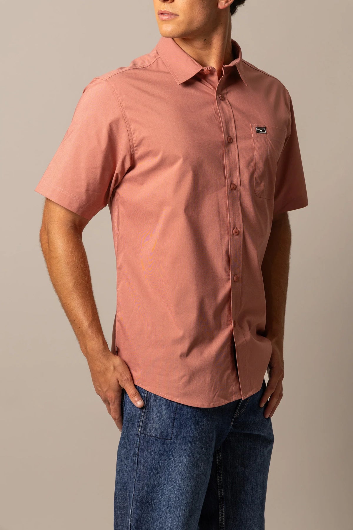 Kimes Ranch Linville Short Sleeve Dress Shirt in Red, side view, with a chest pocket and logo