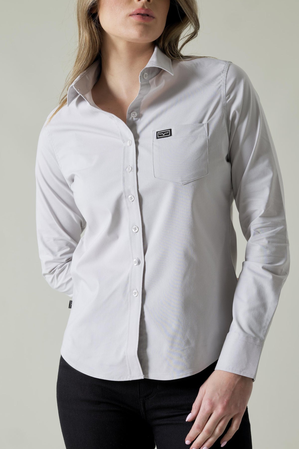 Kimes Ranch Ladies Linville top in Silver White with a chest pocket and logo