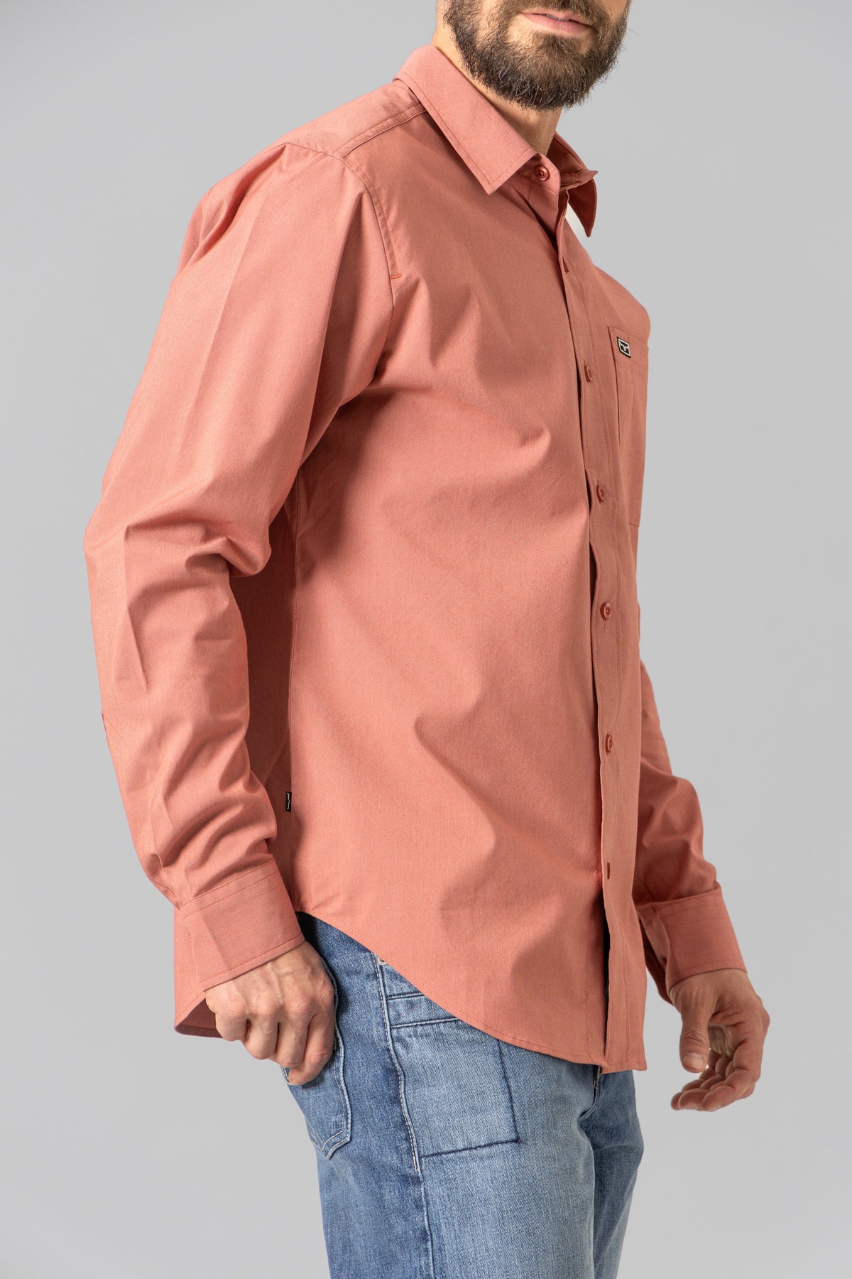 Kimes Ranch Linville Long Sleeve Dress Shirt in Red, side view, with a button front and chest pocket