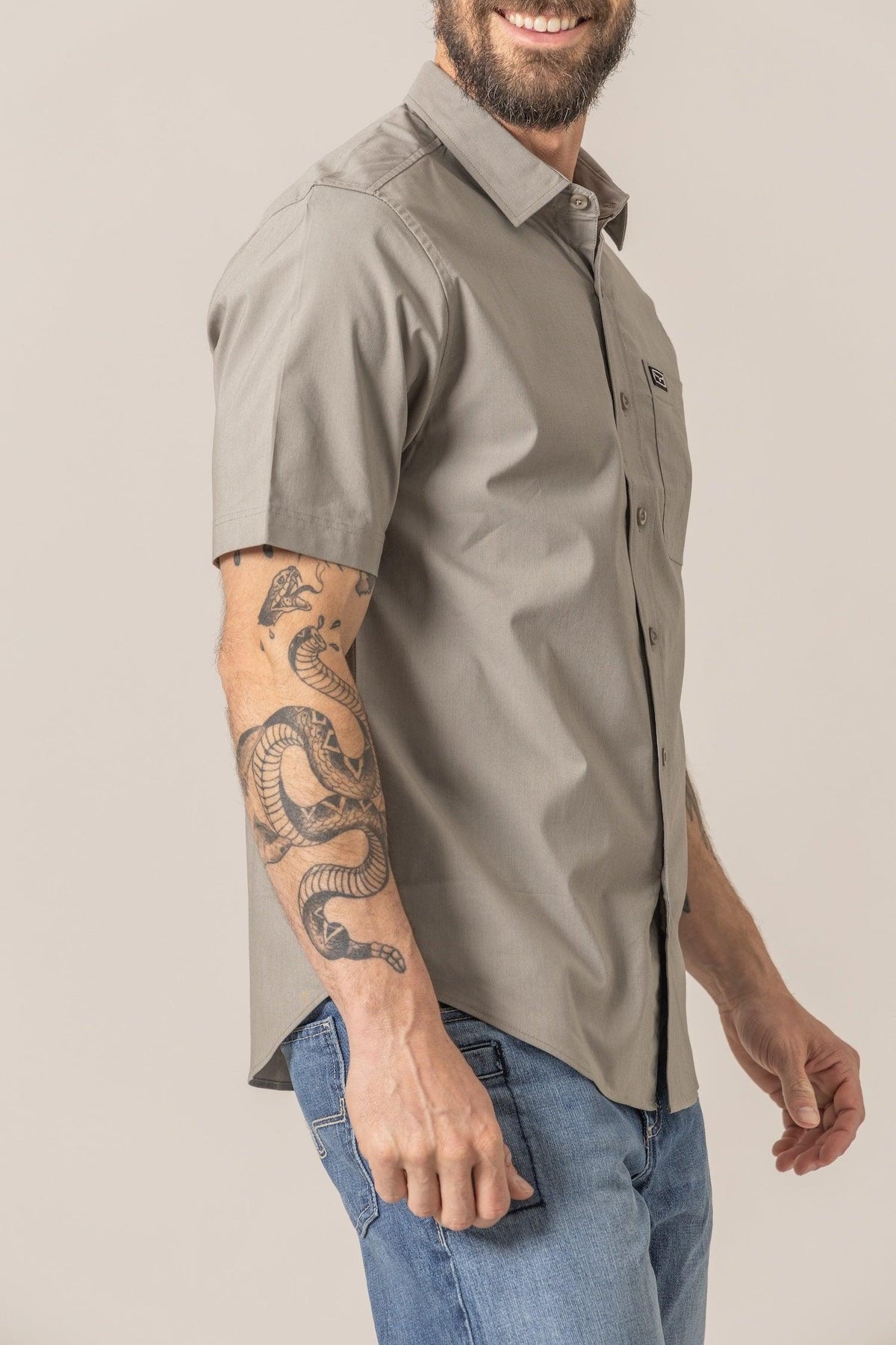 Kimes Ranch Linville Short Sleeve Dress Shirt in Sage, side view, with a collar and chest pocket