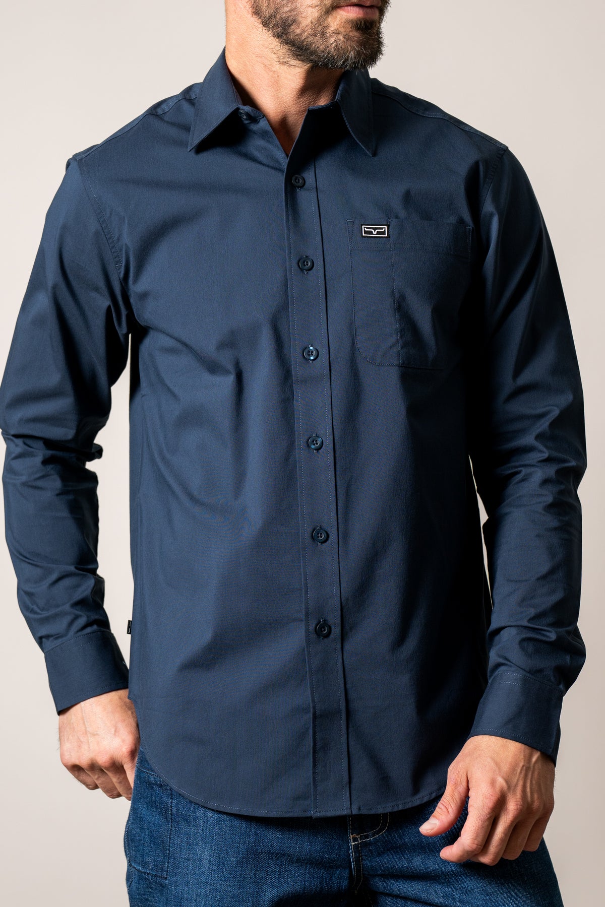 Kimes Ranch Linville Long Sleeve Dress Shirt in Navy with a chest pocket and logo