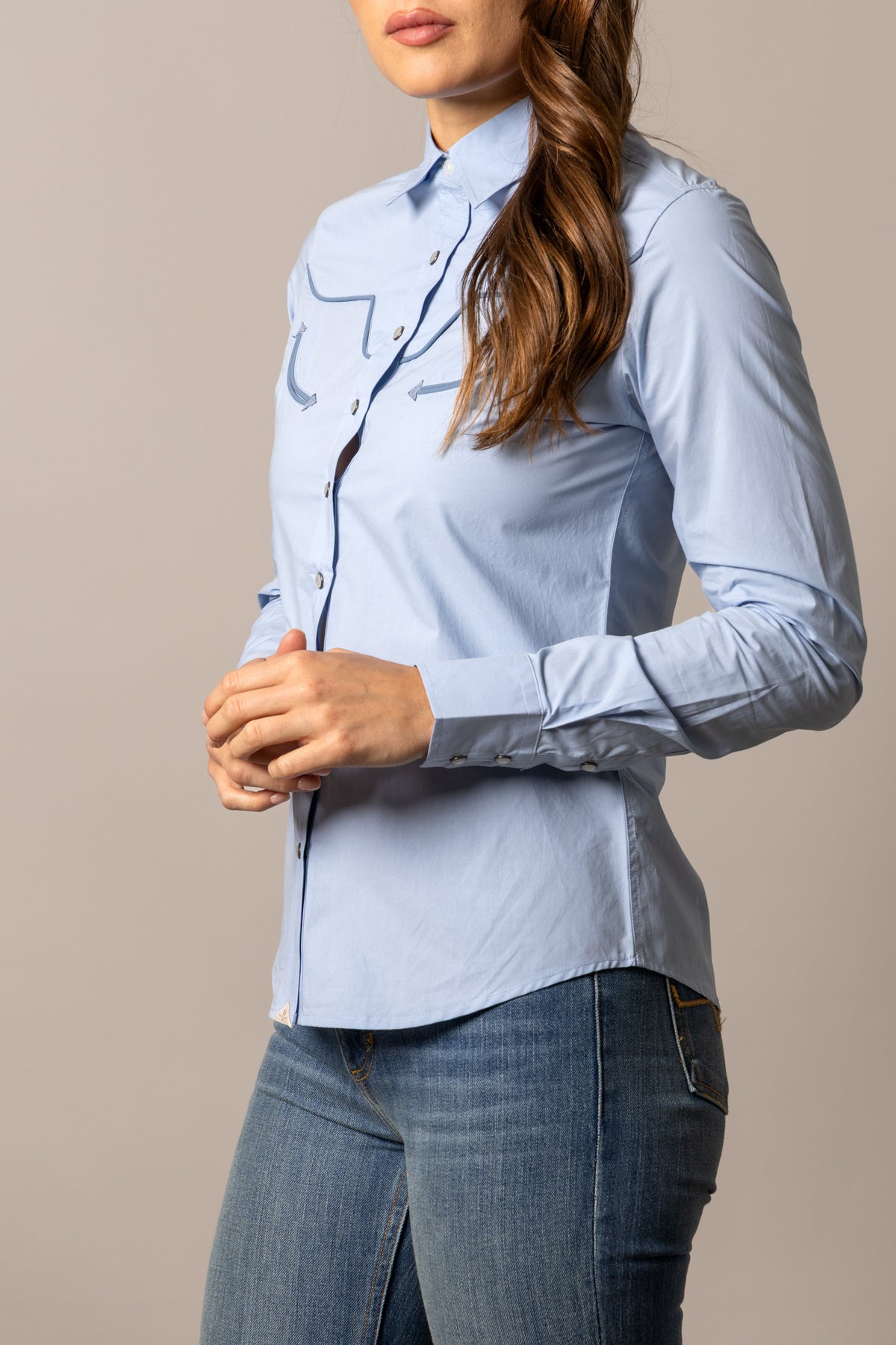 Kimes Ranch Logo Horn Blouse in Light Blue, side view, with contrast stitching and long sleeves