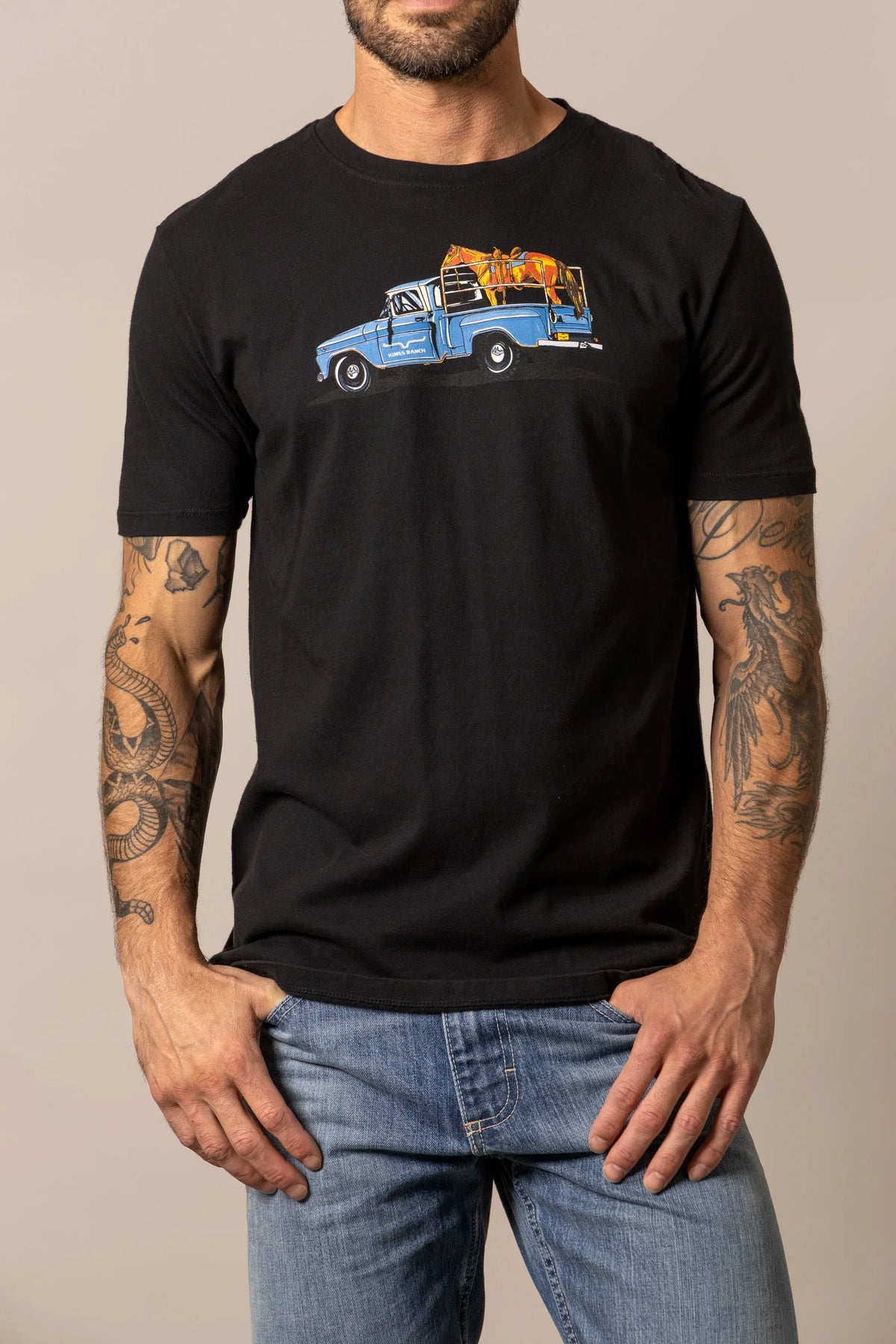 Kimes Ranch Lucky B Truck Black shirt with a blue truck carrying horses graphic
