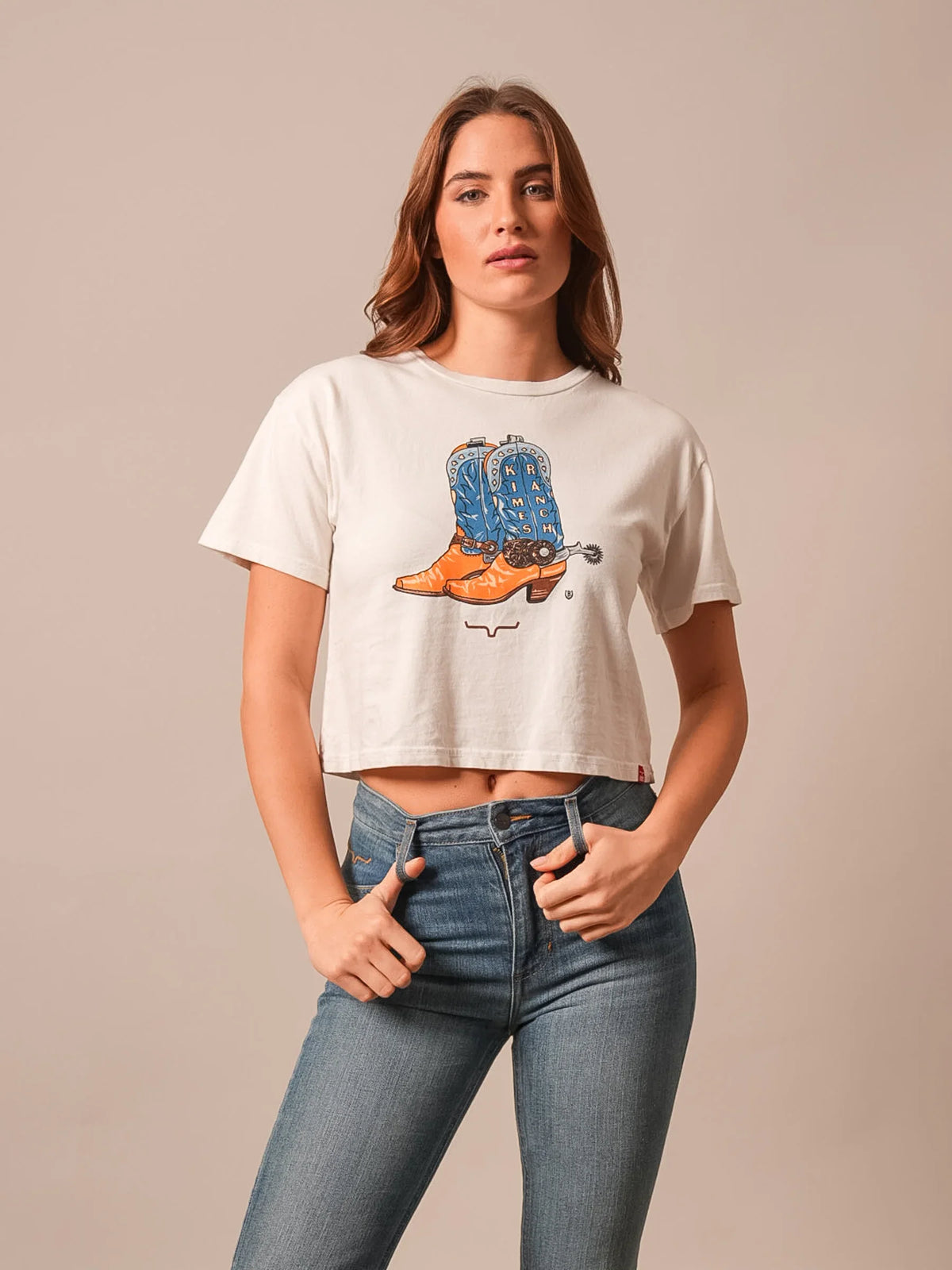 Kimes Ranch Lucky B Boots For Walkin' shirt in Bone with a graphic of blue and orange cowboy boots and the Kimes Ranch logo