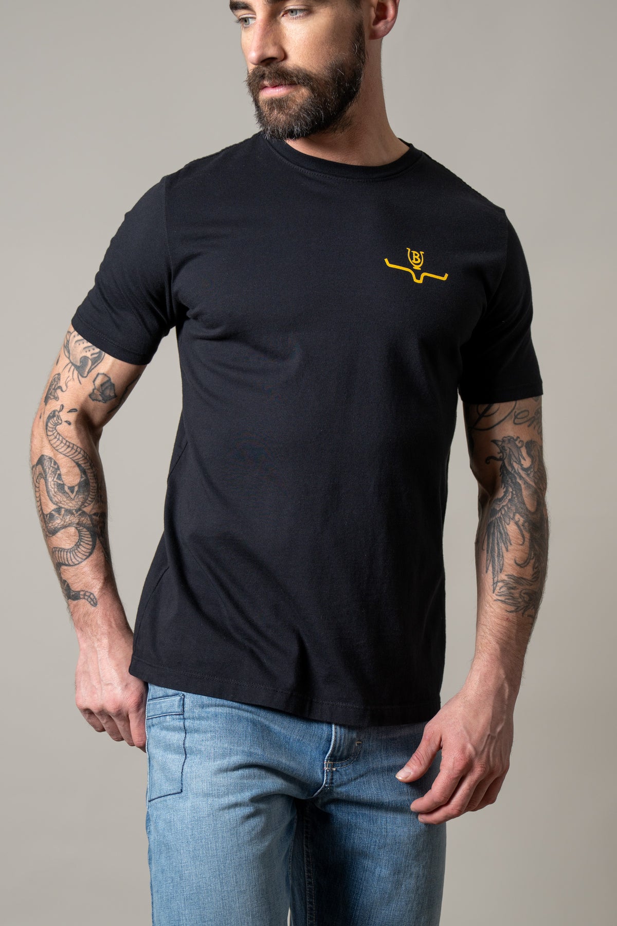 Kimes Ranch Lucky B Iron shirt in Black with a small yellow logo on the chest