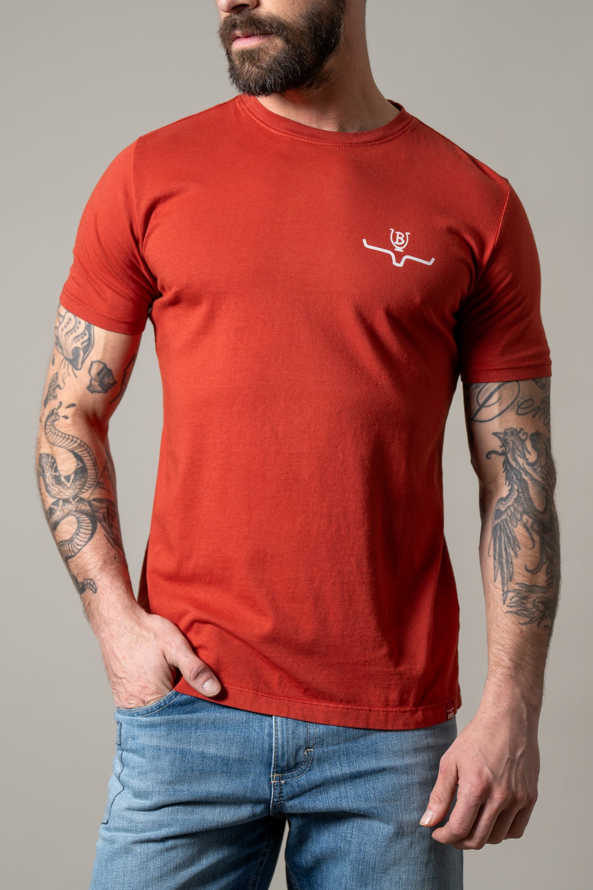 Kimes Ranch Lucky B Iron shirt in Brick Red with a crew neck and the Kimes Ranch logo on the chest