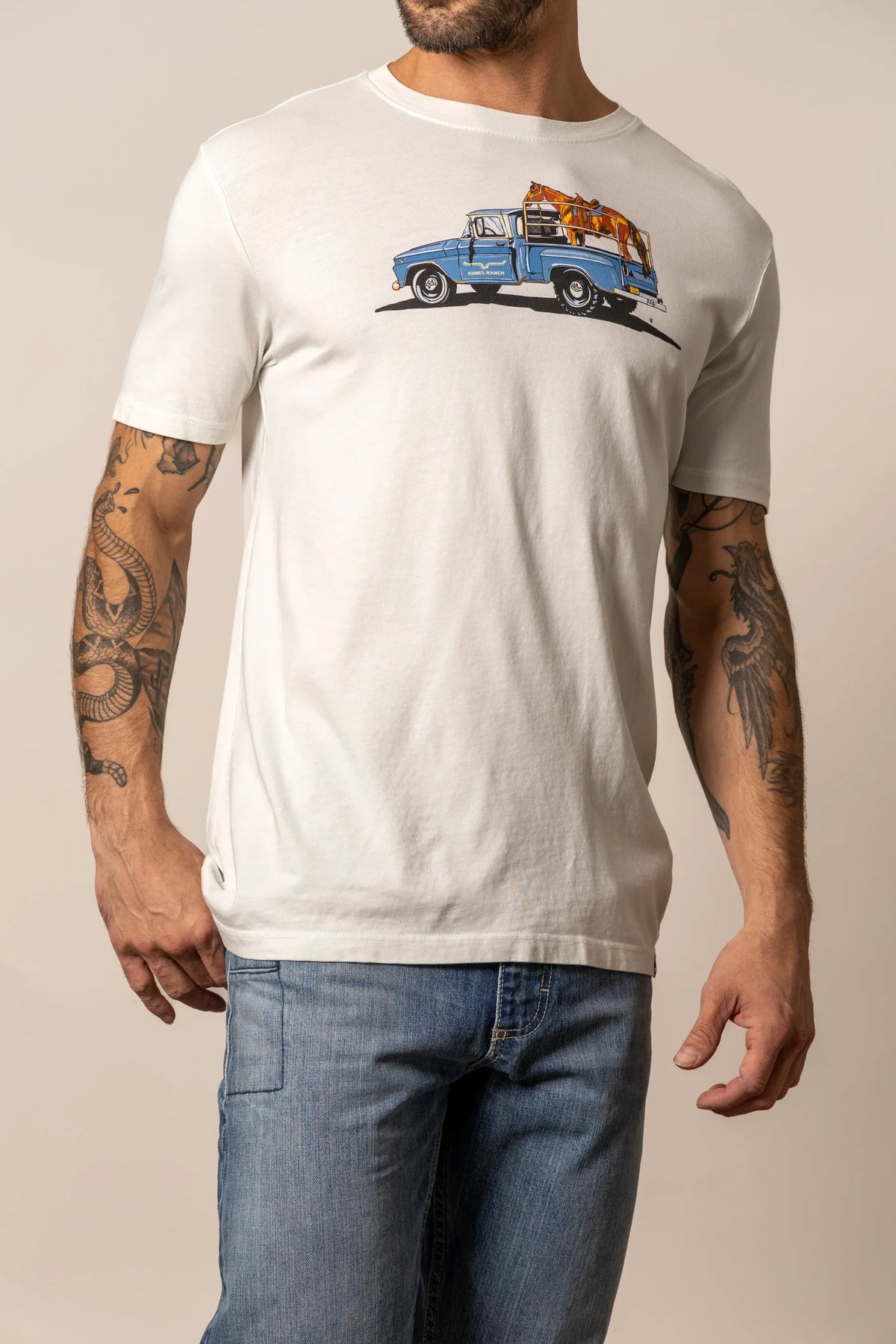 Kimes Ranch Lucky B Truck shirt in Natural with a graphic of a blue vintage truck carrying a longhorn steer
