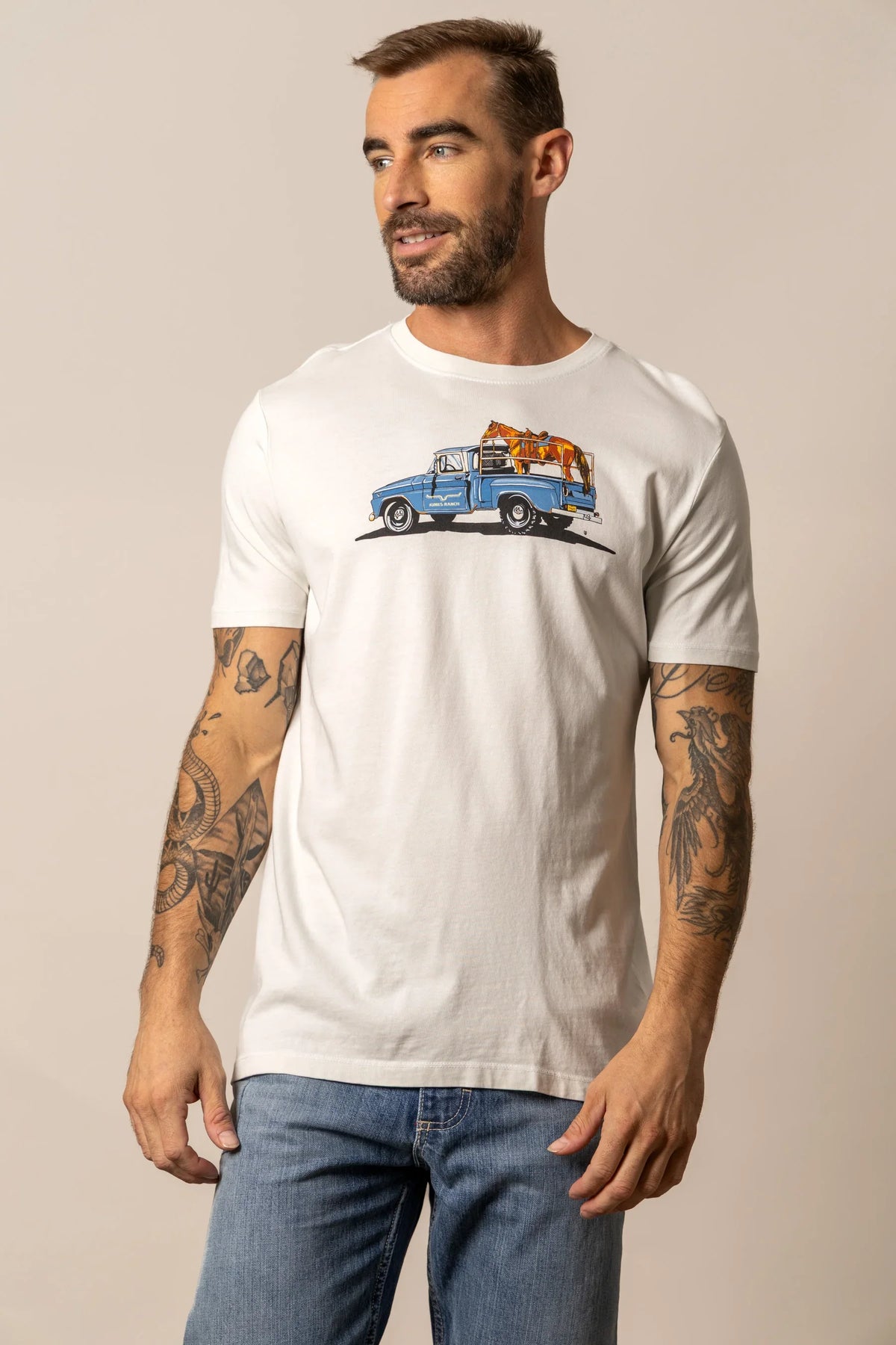Kimes Ranch Lucky B Truck shirt in Natural with a graphic of a blue truck carrying a horse