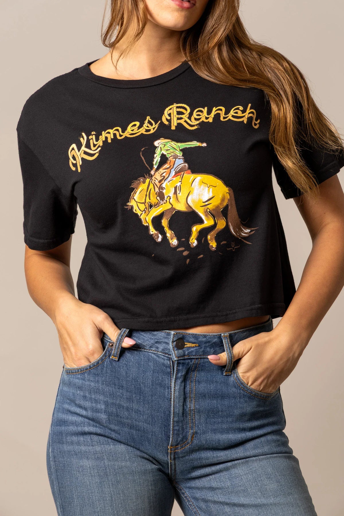 Kimes Ranch Lucky B Rodee-oh! shirt in Black with a graphic of a cowboy riding a bucking horse and Kimes Ranch text