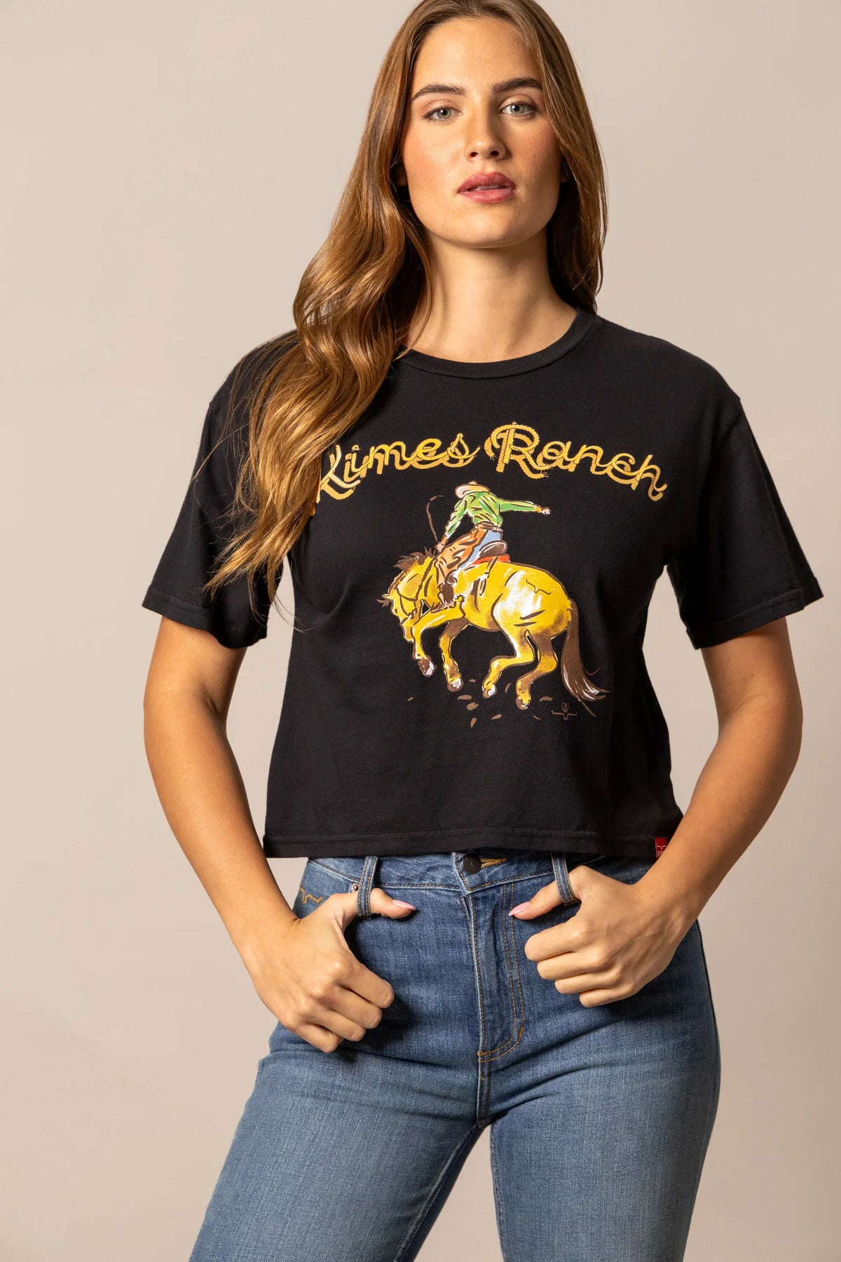 Kimes Ranch Lucky B Rodee-oh! shirt with a graphic of a cowboy riding a bucking horse and the brand name in script
