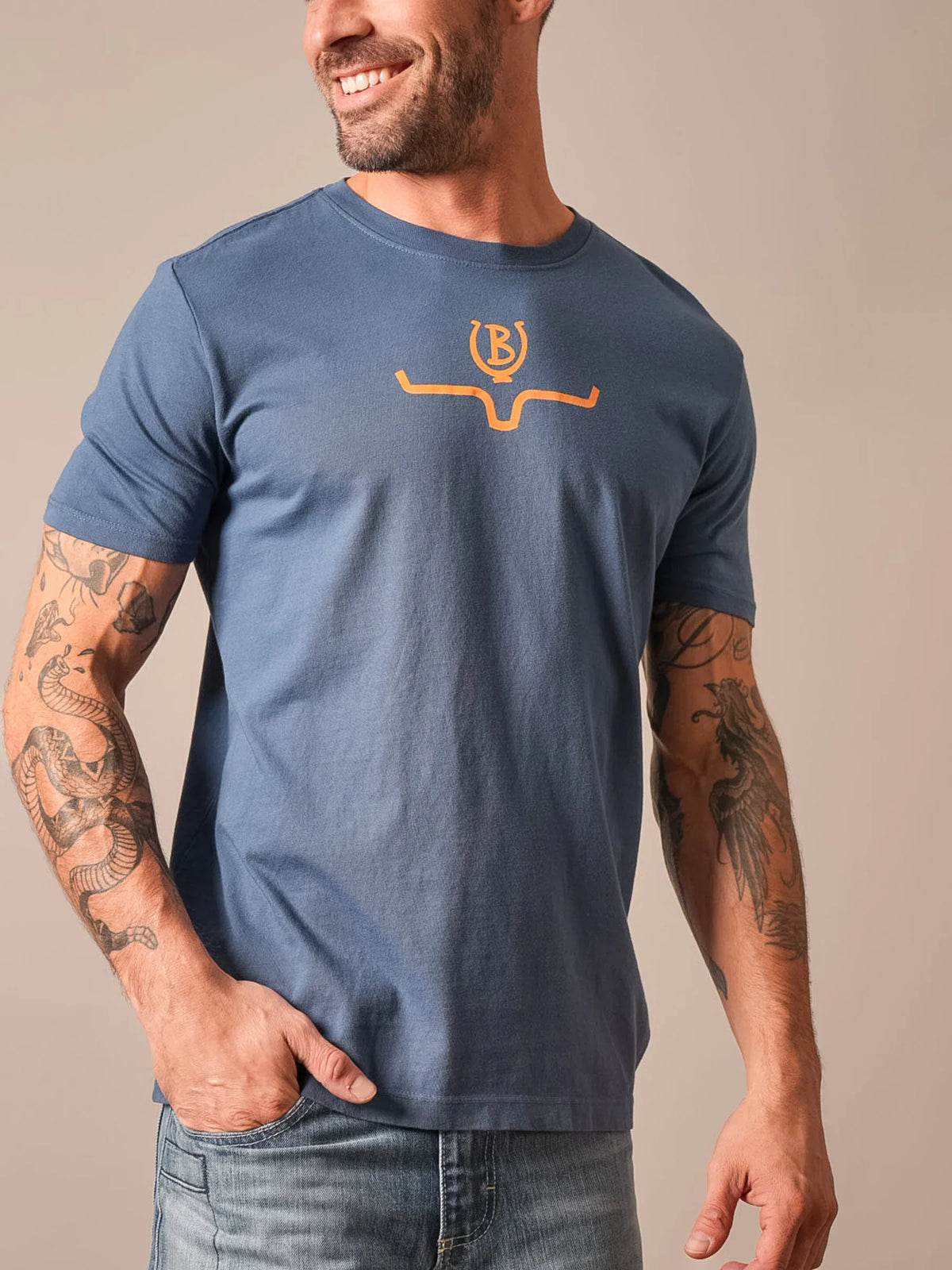Kimes Ranch Lucky B Saddle shirt in Dark Blue with a chest graphic of a horseshoe and letter B