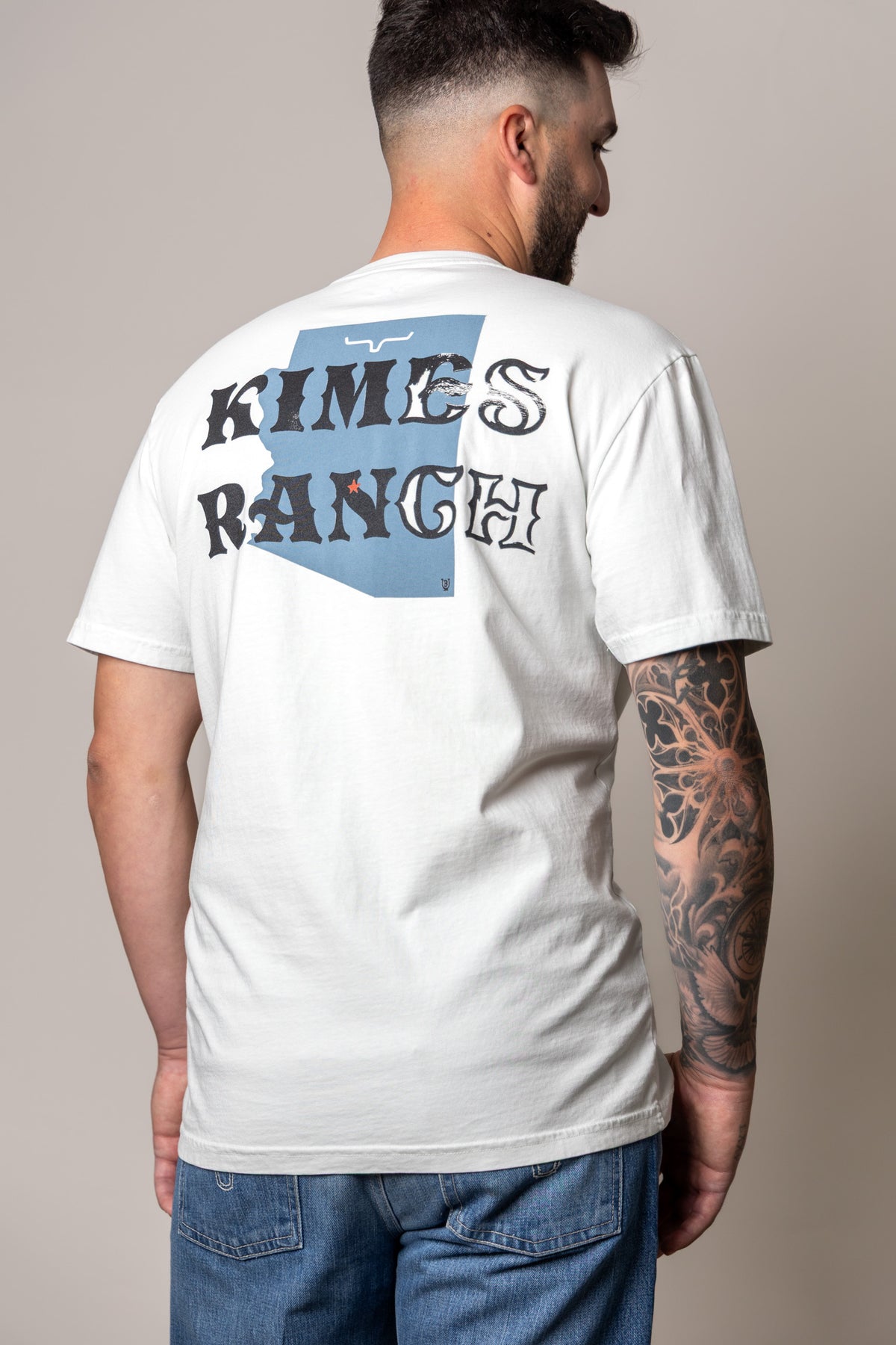 Kimes Ranch Lucky B Statewide shirt in Muted White, back view, with Arizona outline and KIMES RANCH text