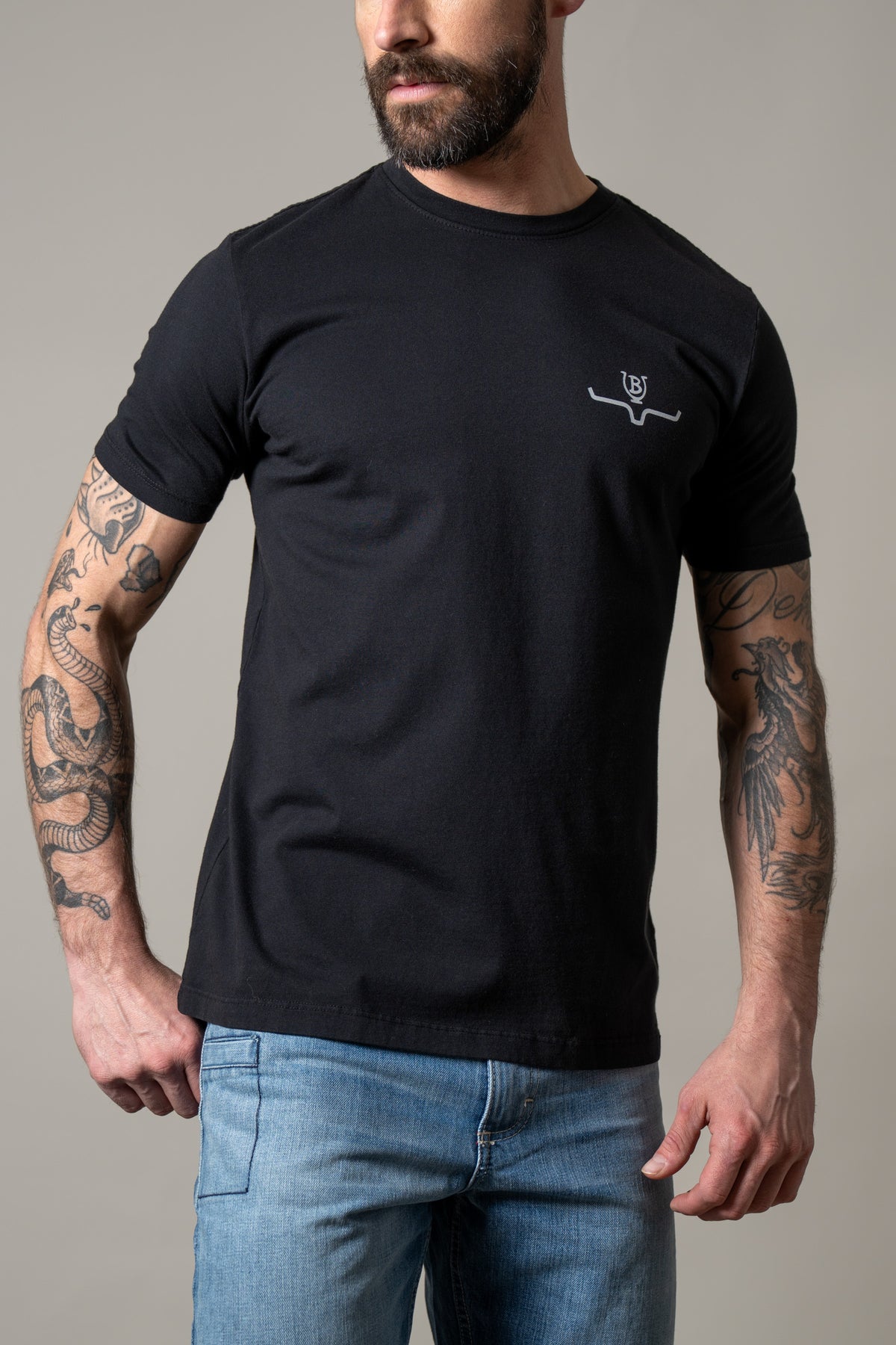 Kimes Ranch Lucky B Tuned shirt in Black with a small white logo on the chest