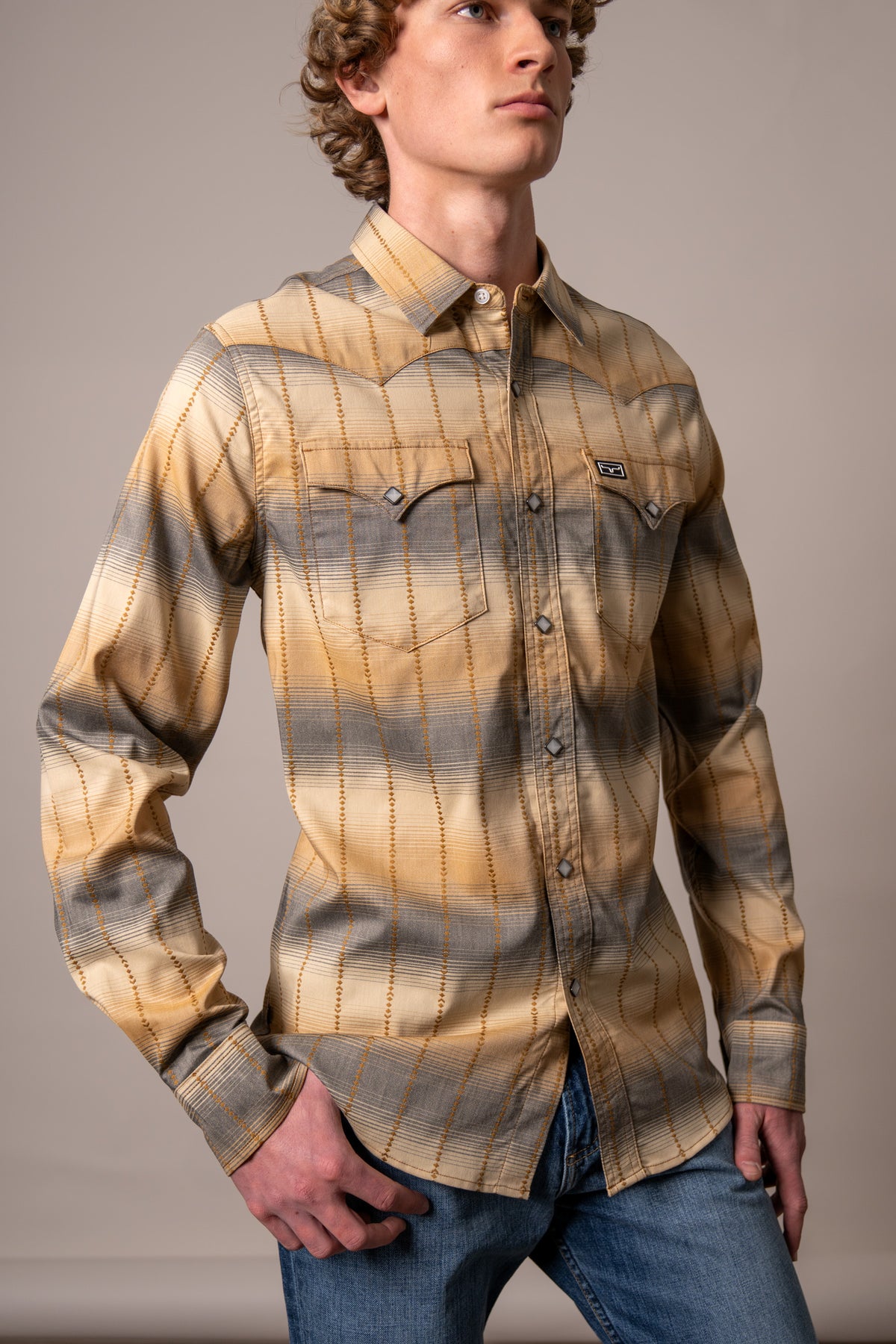 Kimes Ranch Lyle long sleeve dress shirt in Black with a plaid pattern and two chest pockets