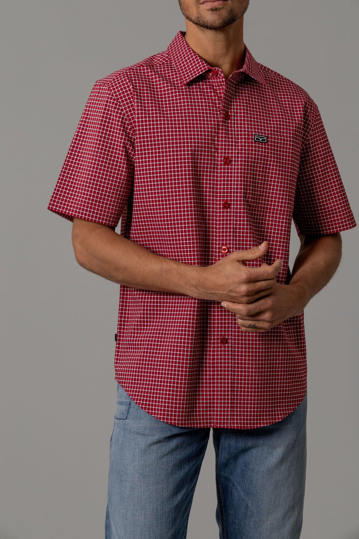 Kimes Ranch MC Cooper Red short sleeve dress shirt with a button front and chest pocket with logo