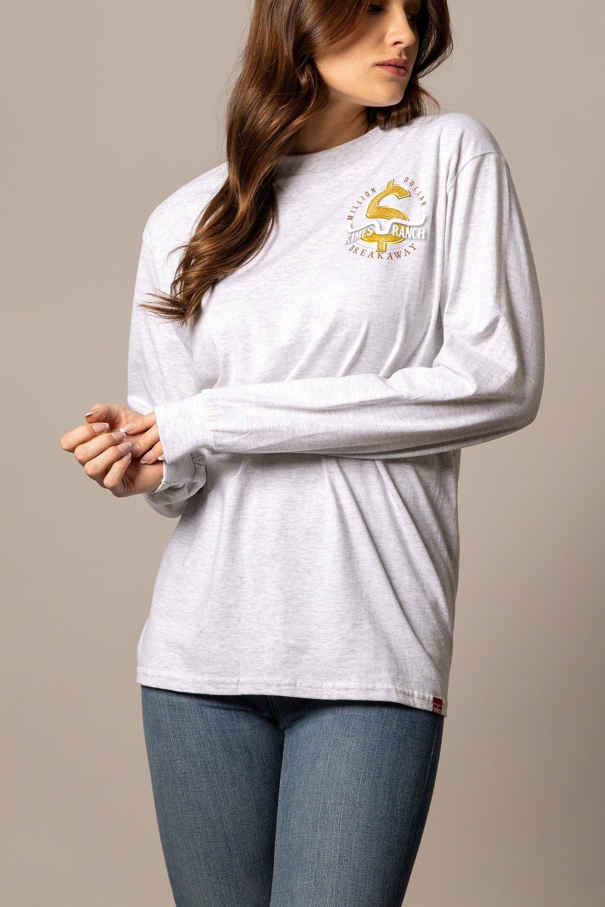Kimes Ranch MDB Long Sleeve shirt in Ash Heather, side view, with a Million Dollar Breakaway graphic on the chest