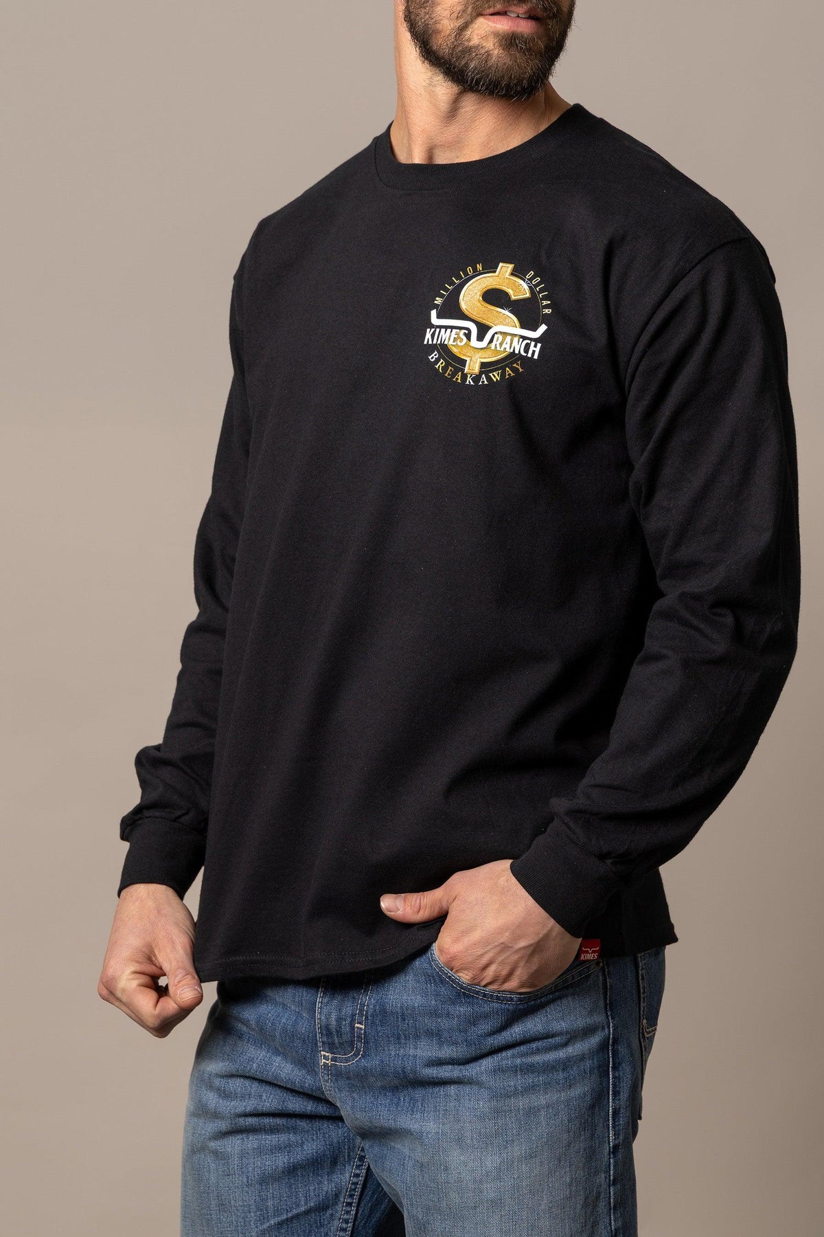Kimes Ranch MDB Long Sleeve shirt in Black with a gold and white Million Dollar Breakaway graphic on the chest