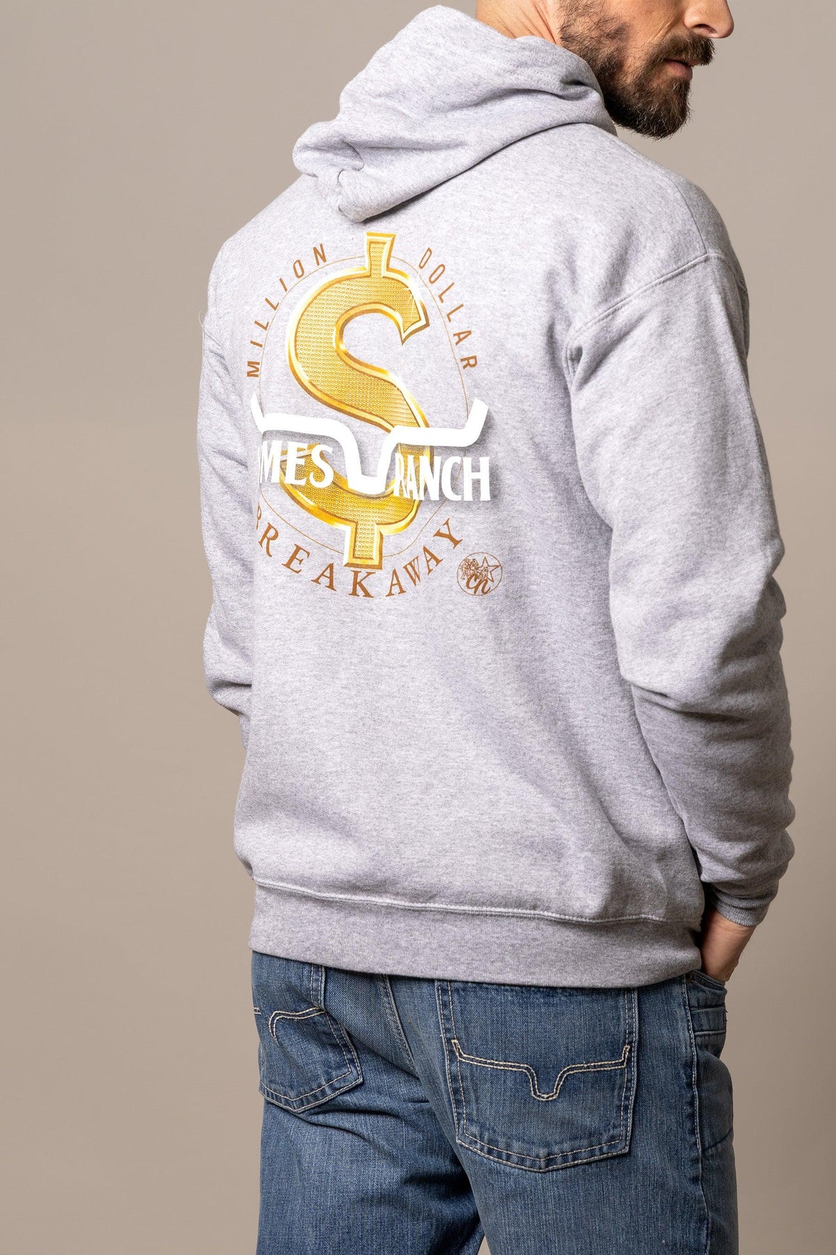 Kimes Ranch MDB Zip Up hoodie in grey with a gold dollar sign graphic and Million Dollar Breakaway text on the back