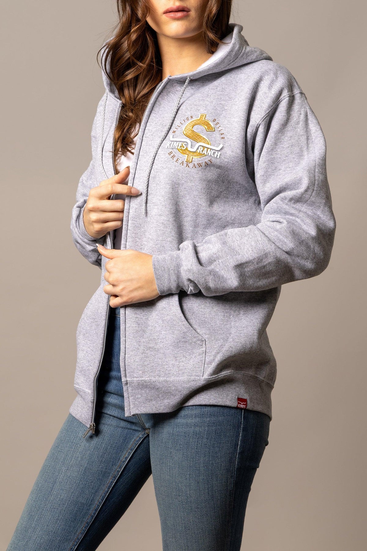 Kimes Ranch MDB Zip Up hoodie in Light Grey Heather with a gold dollar sign graphic and kangaroo pocket