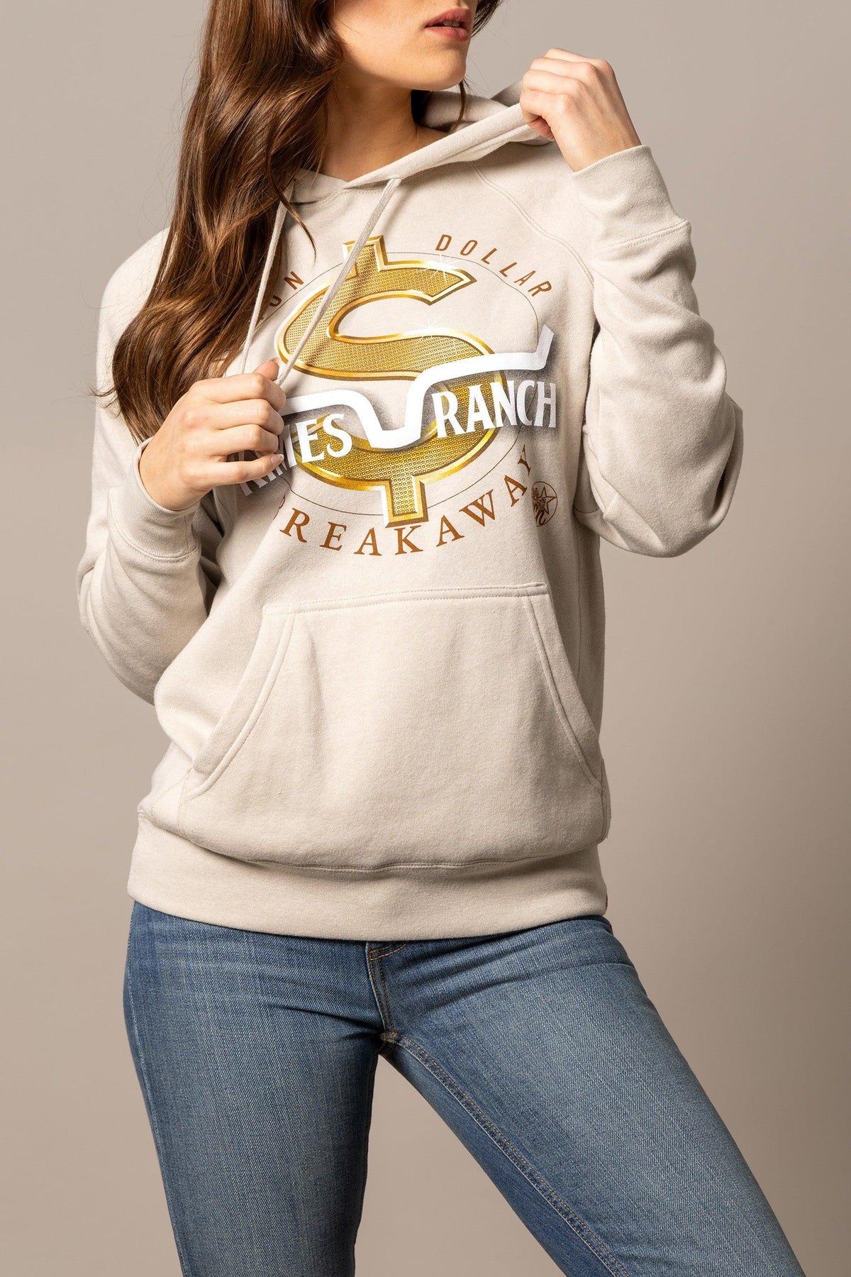 Kimes Ranch MDB Pullover hoodie in Stone with a gold dollar sign graphic and Kimes Ranch logo