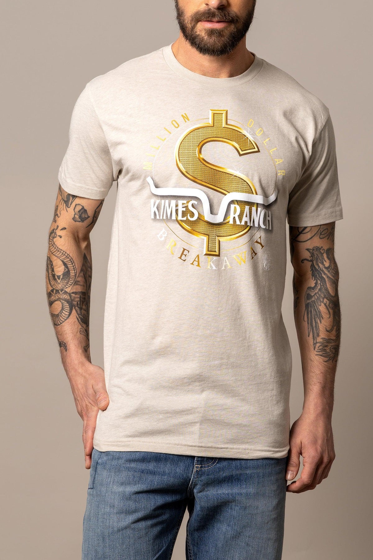 Kimes Ranch Men's MDB Tee in heather cream with a gold dollar sign graphic and white Kimes Ranch logo