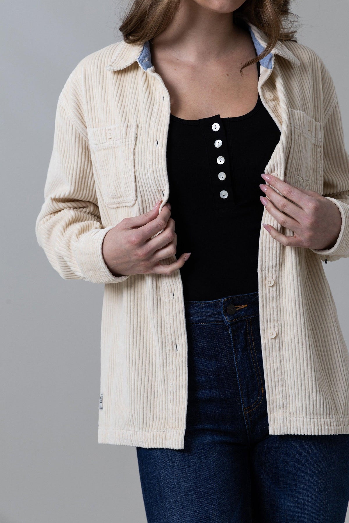 Kimes Ranch Luna Cord top in Tan with a collar, front pockets, and long sleeves