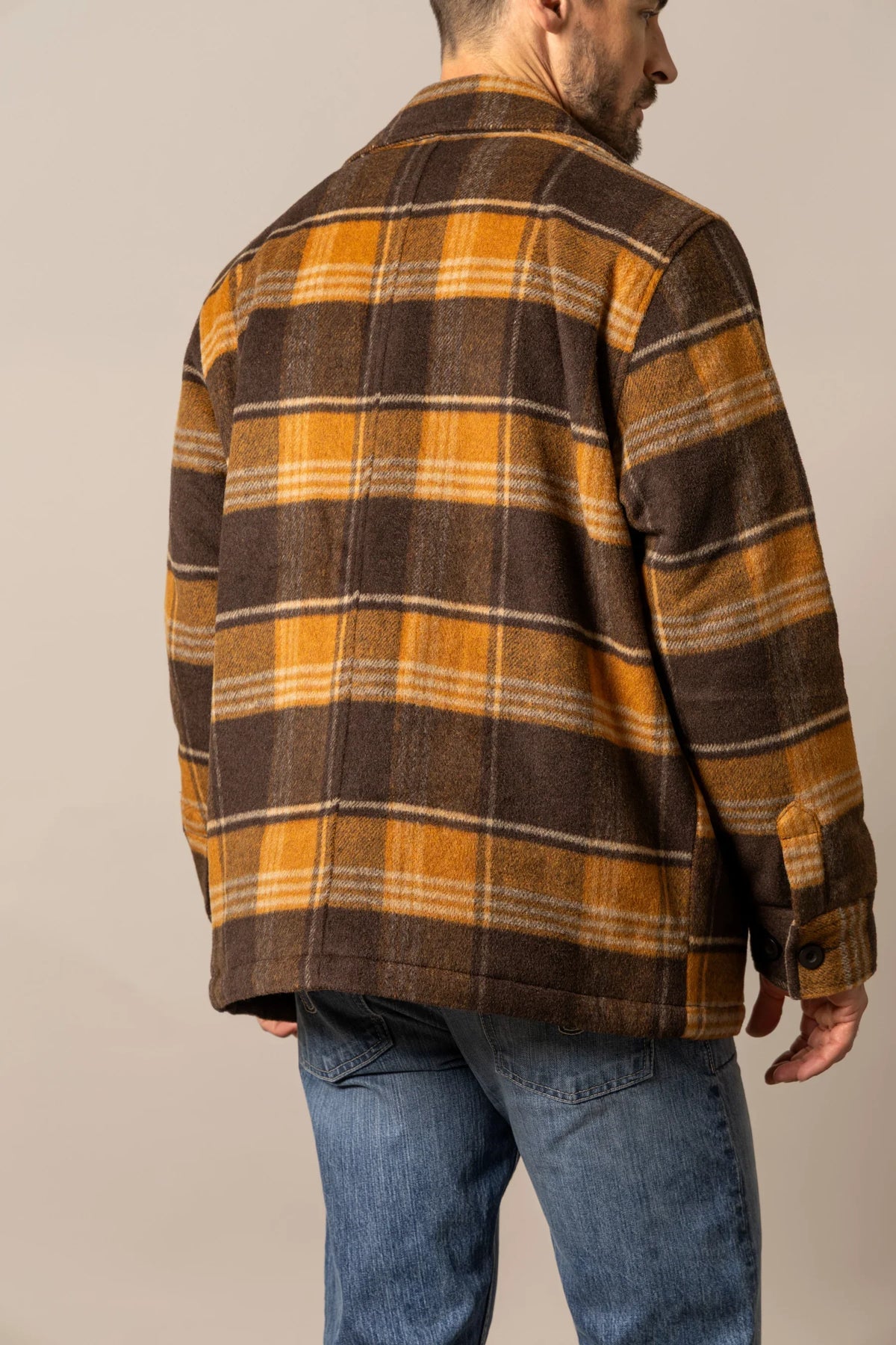 Kimes Ranch Marquette Wool Jacket in Brown, back view, with a yellow and white plaid pattern and buttoned sleeve cuffs