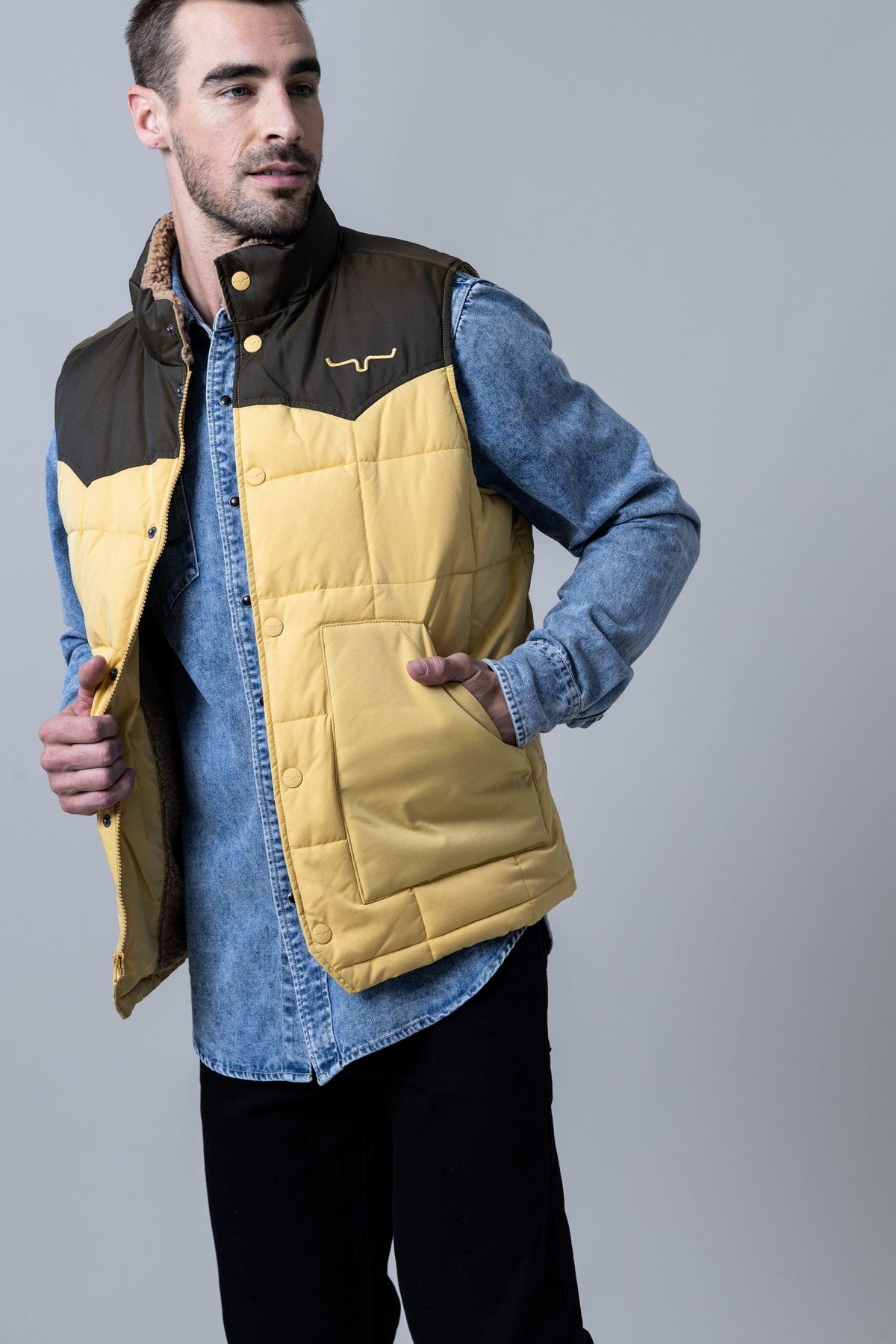 Kimes Ranch Muir Trail Vest in Dark Brown with mustard yellow quilted body and front patch pocket