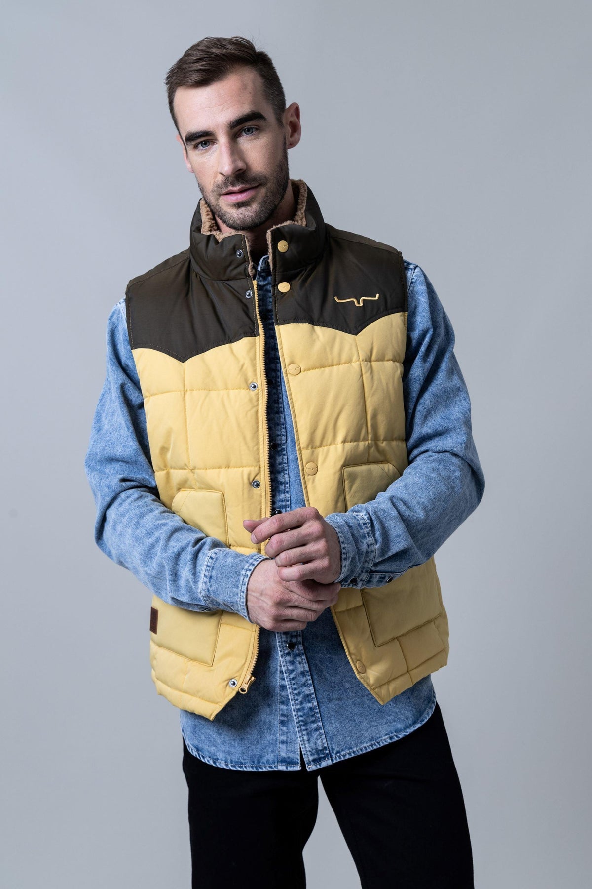 Kimes Ranch Muir Trail Vest in Dark Brown with quilted yellow body and front pockets