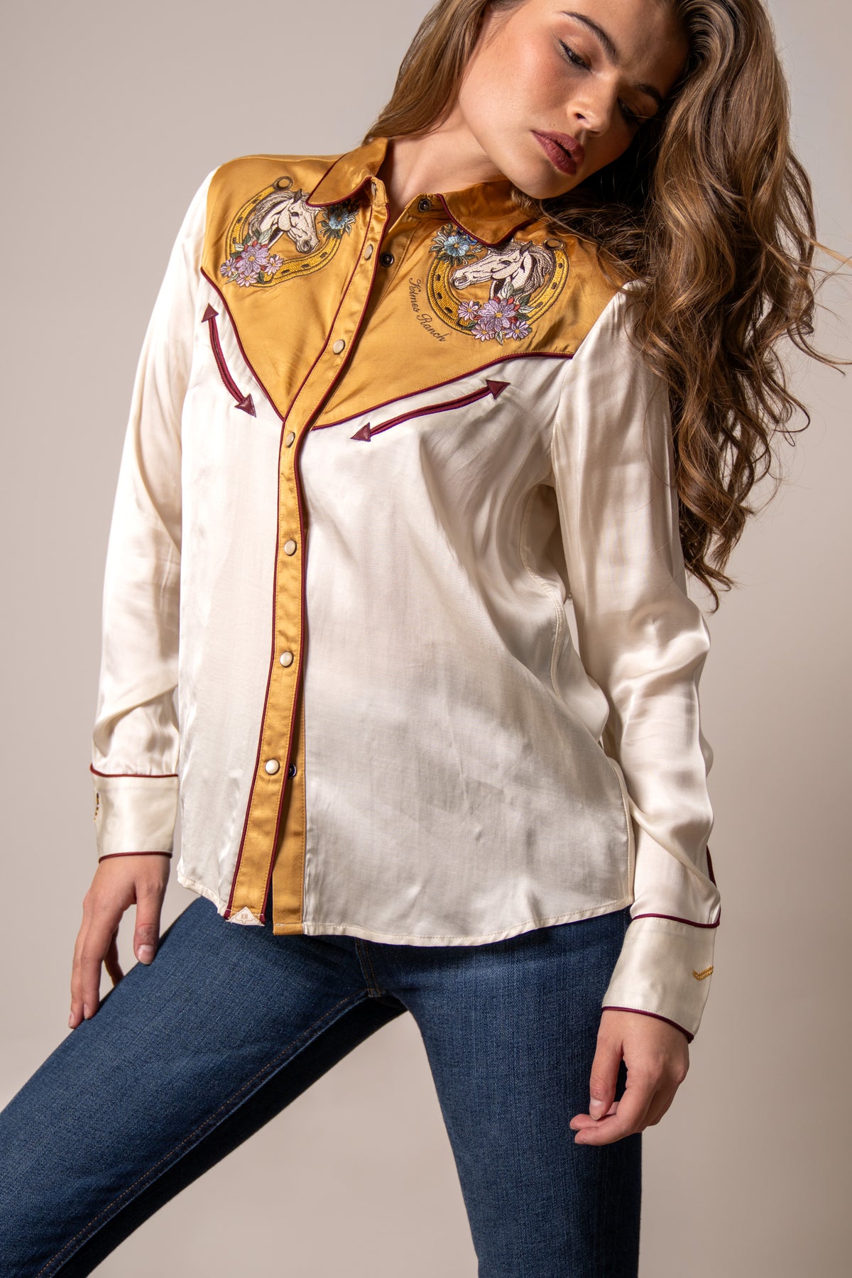Kimes Ranch Merada top in Soft Gold with embroidered horse heads and floral details on the yoke