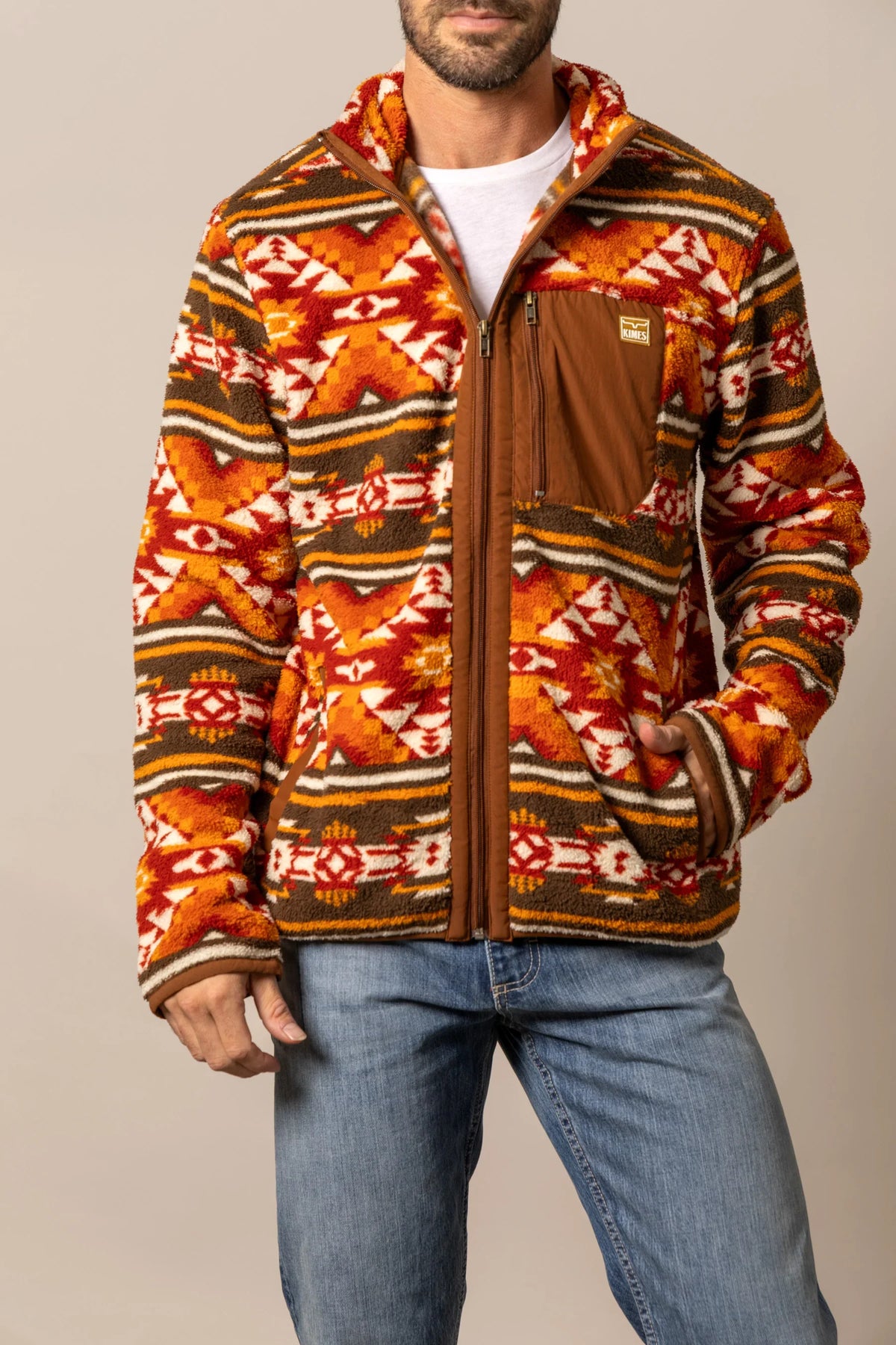 Kimes Ranch Mercury Fleece hoodie in Brown with a multicolor geometric pattern and a zippered chest pocket