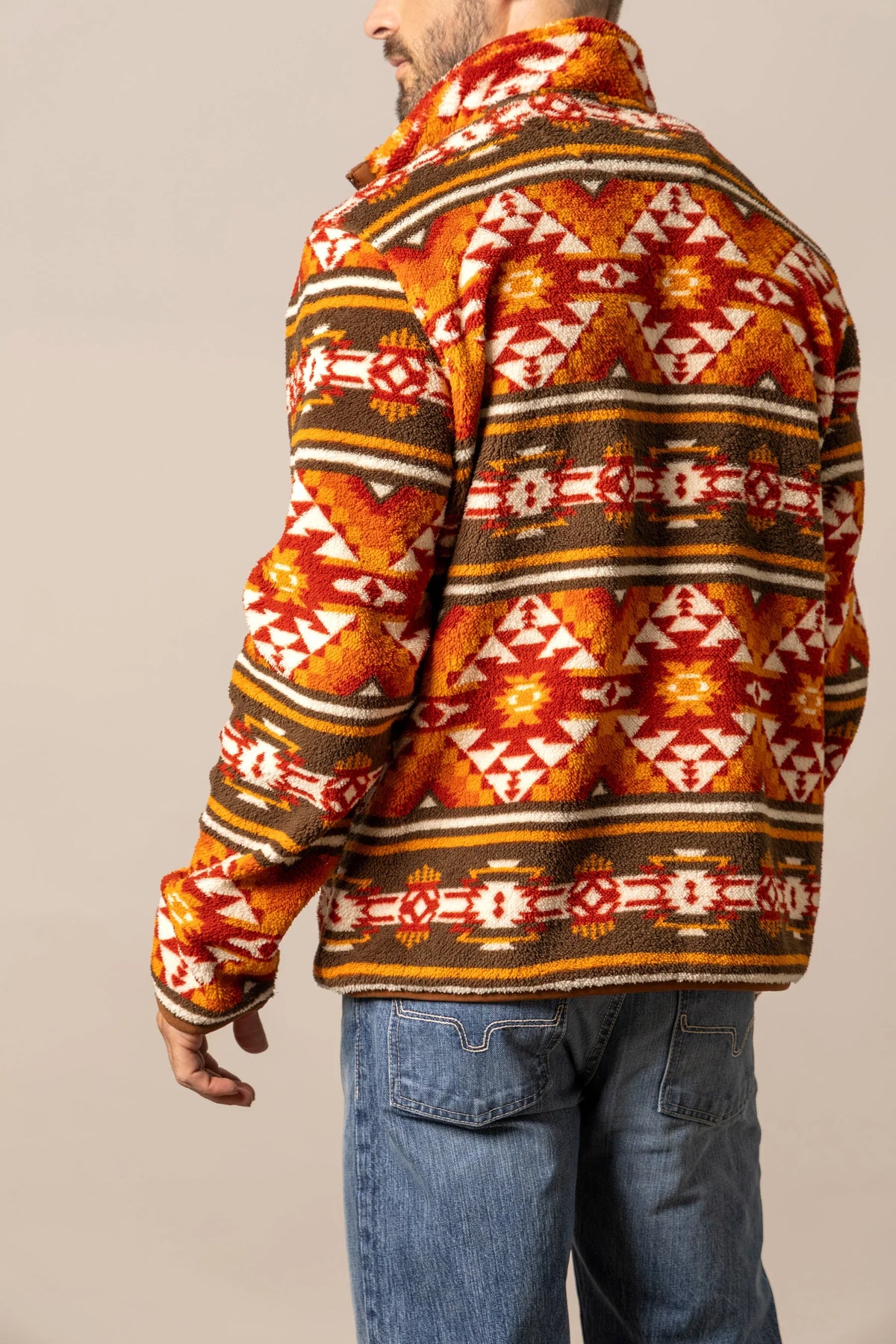 Kimes Ranch Mercury Fleece hoodie in Brown, back view, with a geometric pattern in orange and white