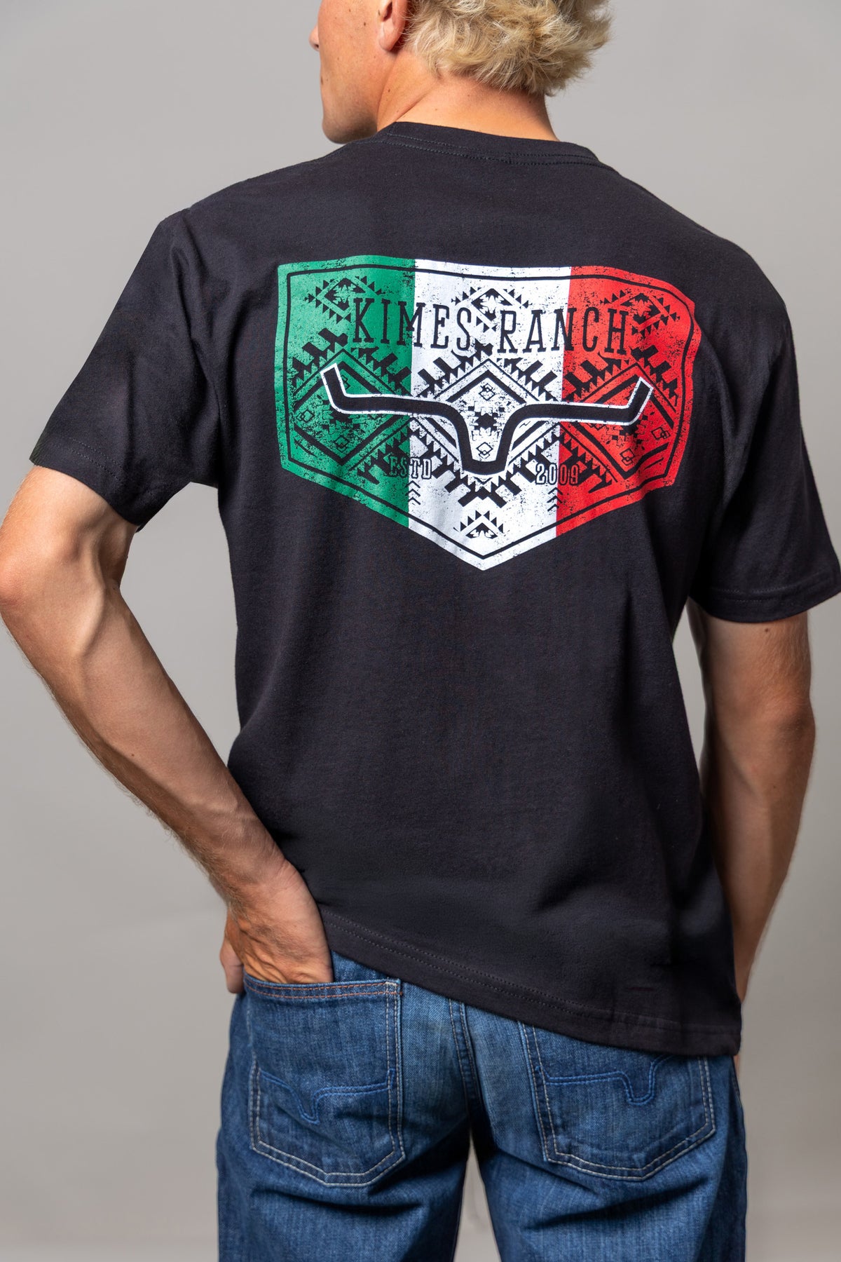 Kimes Ranch Mexicana Plate, back view, shirt back with a Mexican flag graphic and Kimes Ranch logo