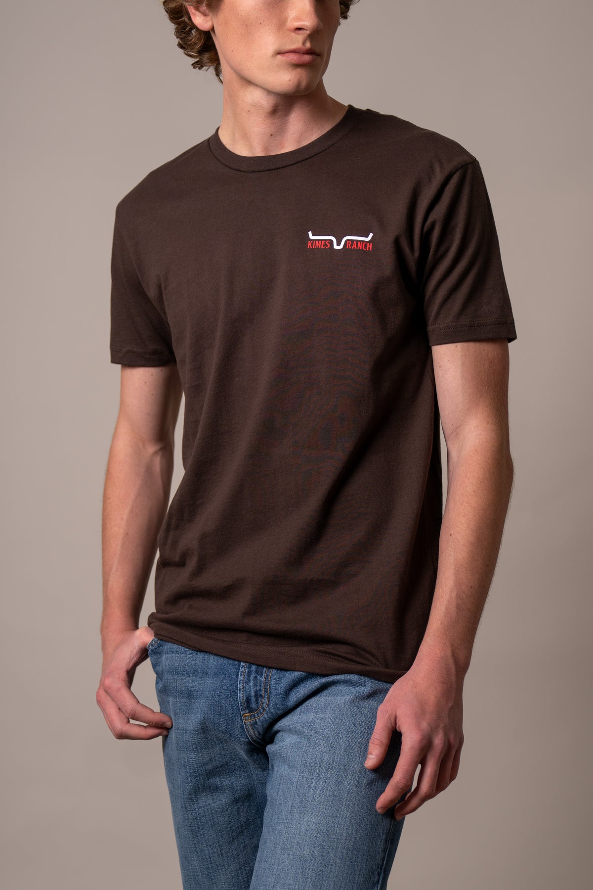 Kimes Ranch Mexico Prairie shirt in Dark Chocolate with short sleeves and the Kimes Ranch logo on the chest
