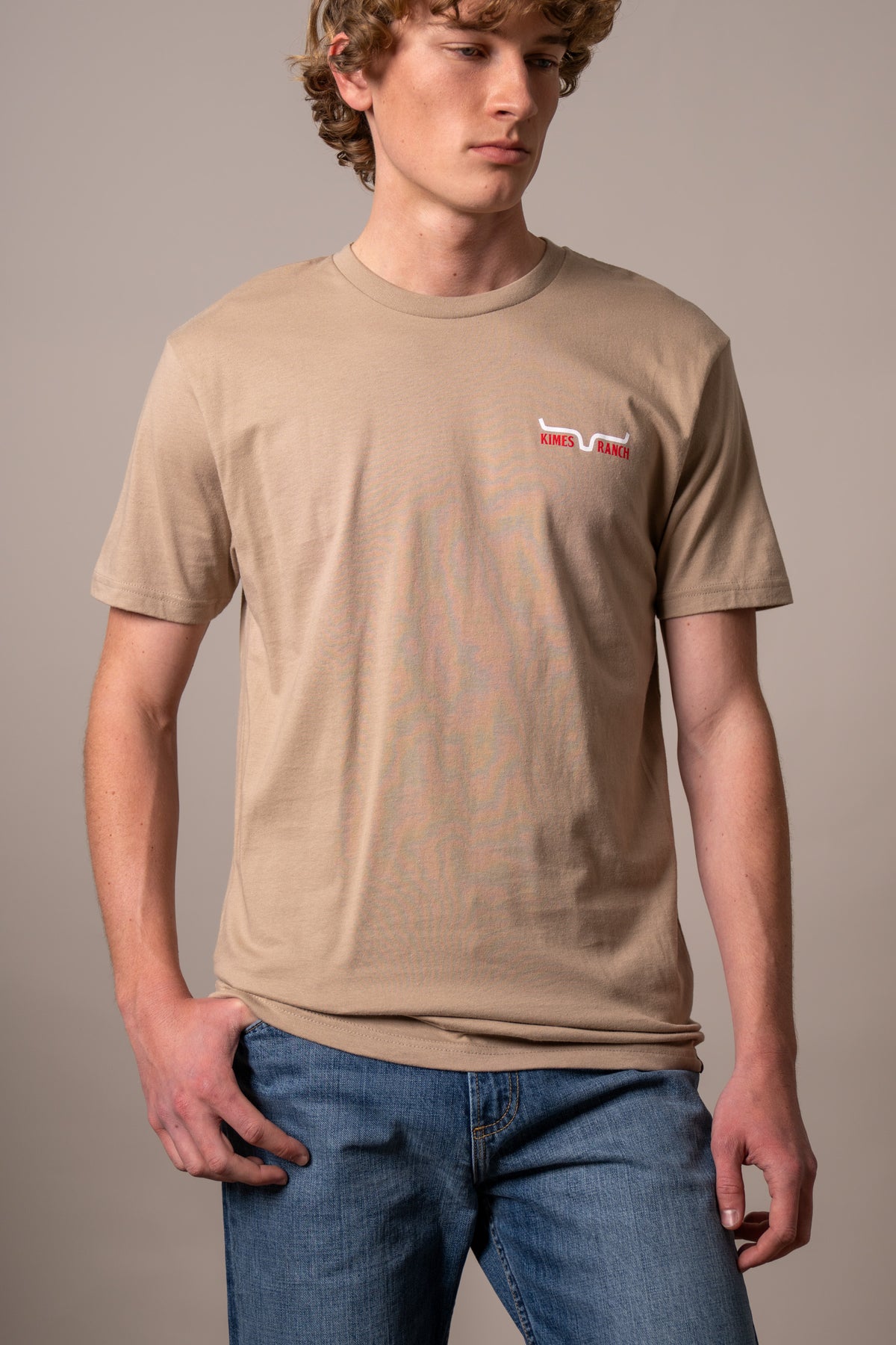 Kimes Ranch Mexico Prairie shirt in Tan with a crewneck collar and the Kimes Ranch logo on the chest