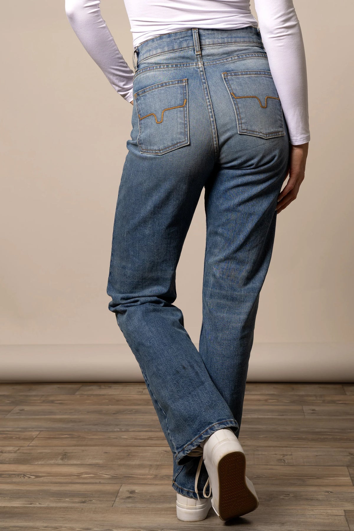 Kimes Ranch Mia jeans in Mid Wash, back view, with signature back pocket stitching and a relaxed fit