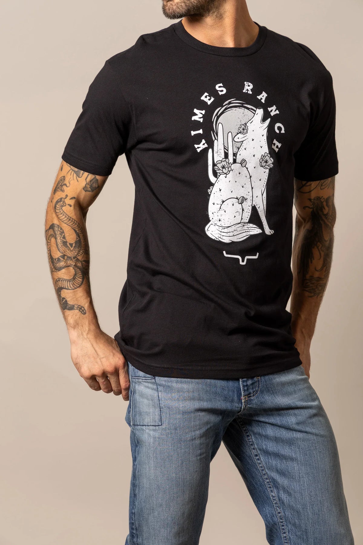 Kimes Ranch Night Call Black shirt with a howling coyote graphic and Kimes Ranch logo