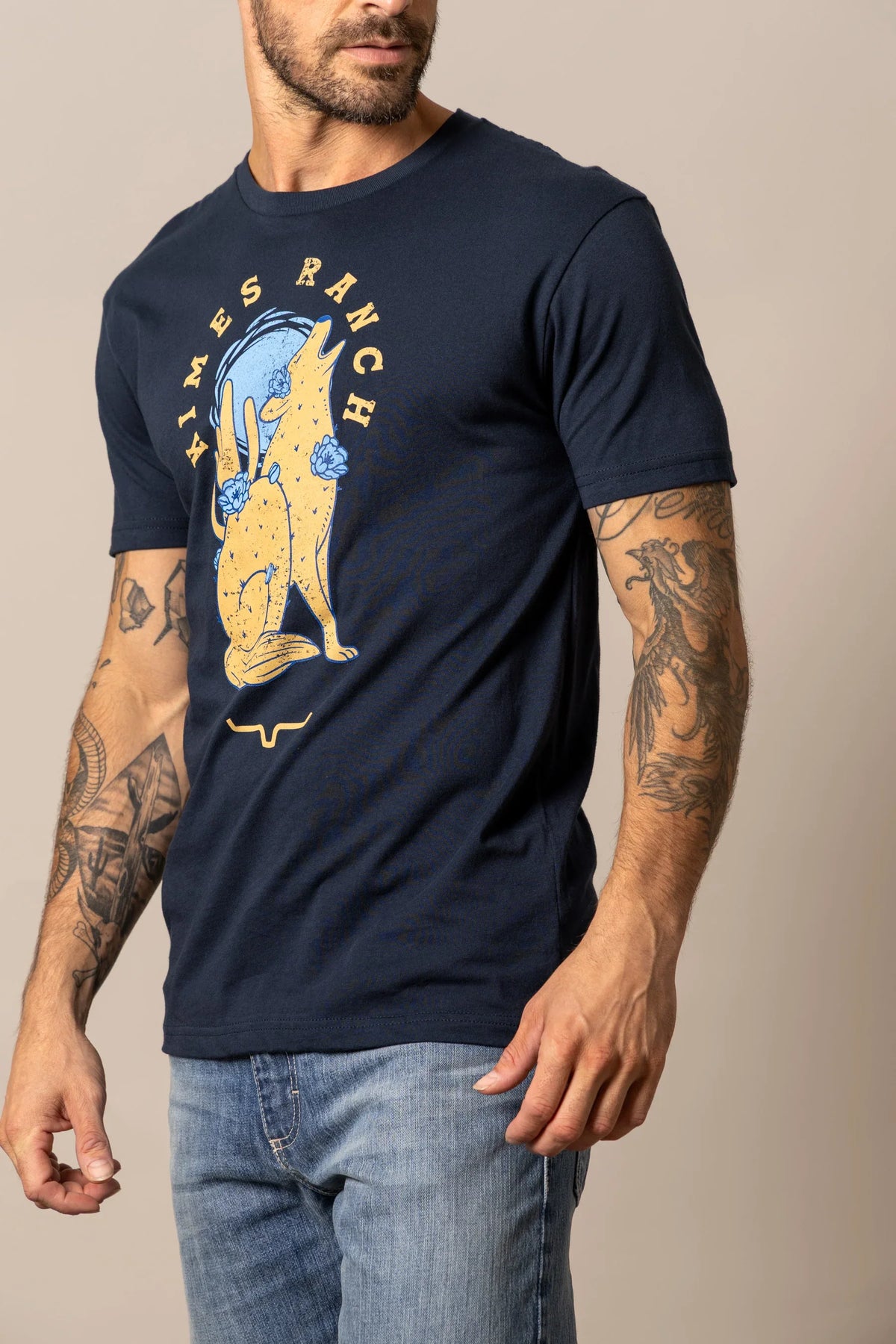 Kimes Ranch Night Call shirt in Midnight Navy with a howling coyote graphic and Kimes Ranch logo