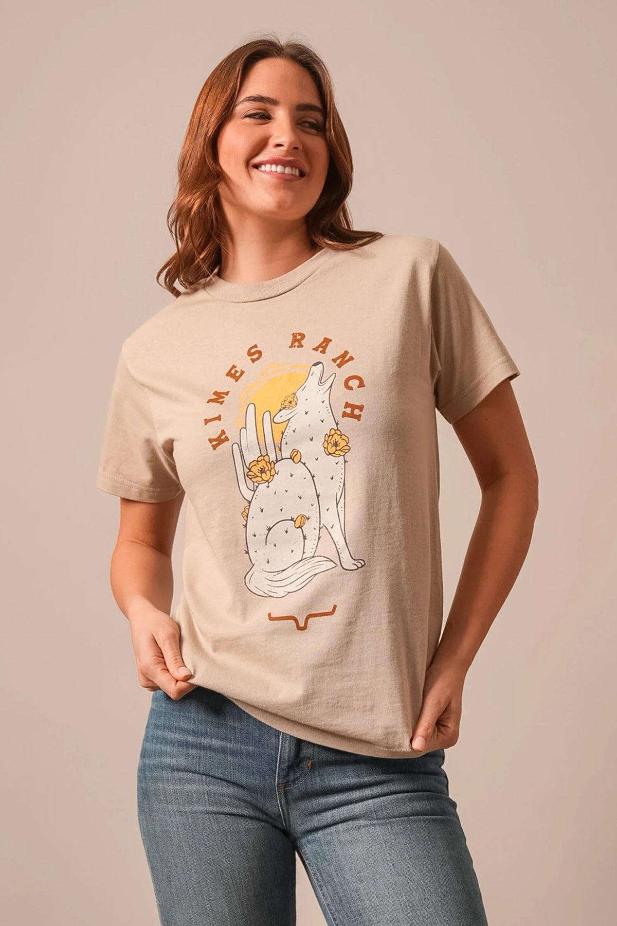 Kimes Ranch Night Call shirt in Sand with a graphic of a howling coyote and cactus with the Kimes Ranch logo