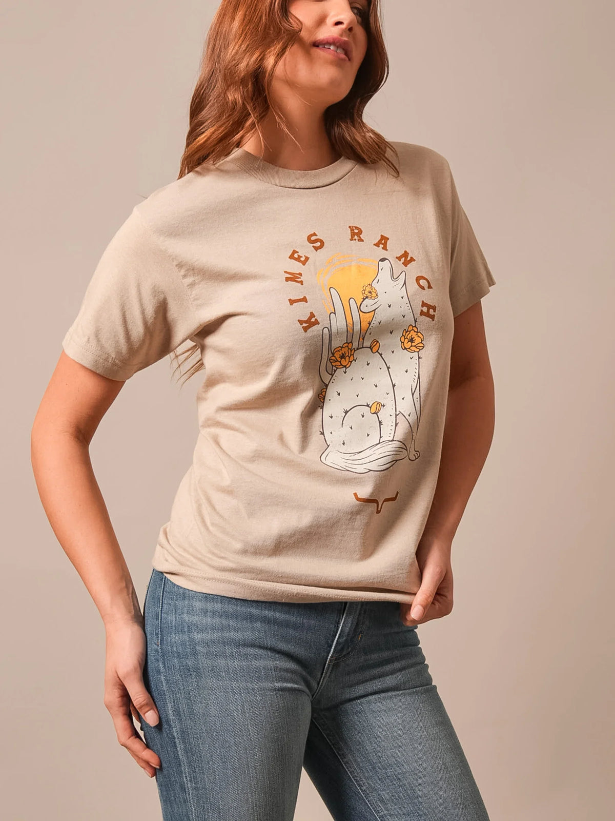 Kimes Ranch Night Call shirt in Sand with a howling coyote graphic and Kimes Ranch logo