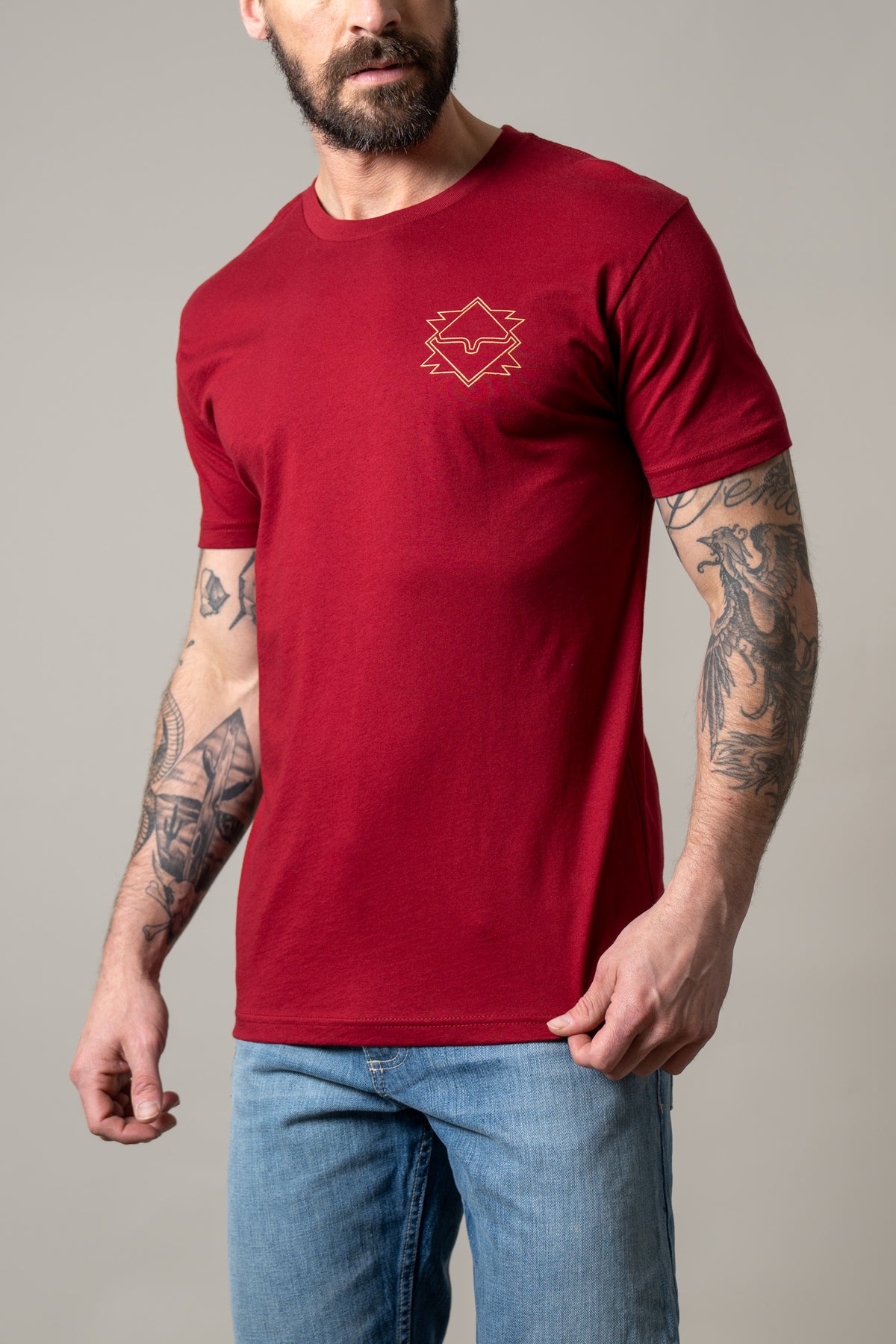 Kimes Ranch North Star short sleeve shirt in Cardinal with a gold logo on the chest