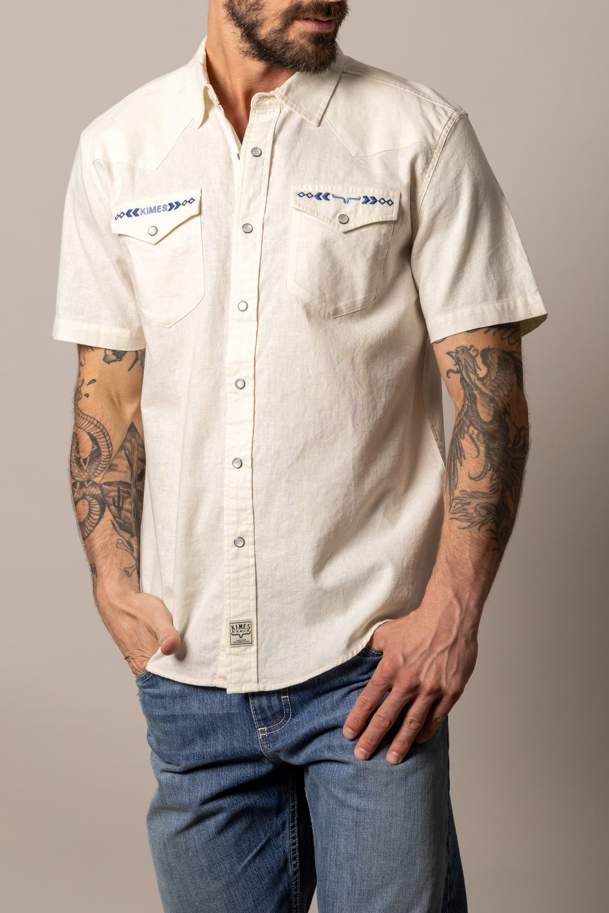 Kimes Ranch Nuce short sleeve dress shirt in Stone with embroidered Kimes Ranch logo on the left chest pocket