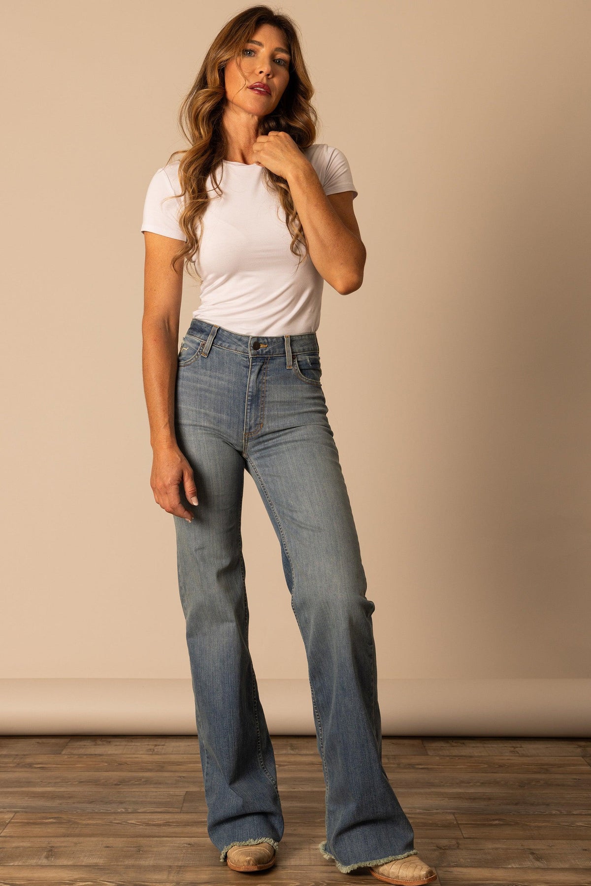 Kimes Ranch Olivia jeans in Light Wash with a high waist and flared leg with a raw hem