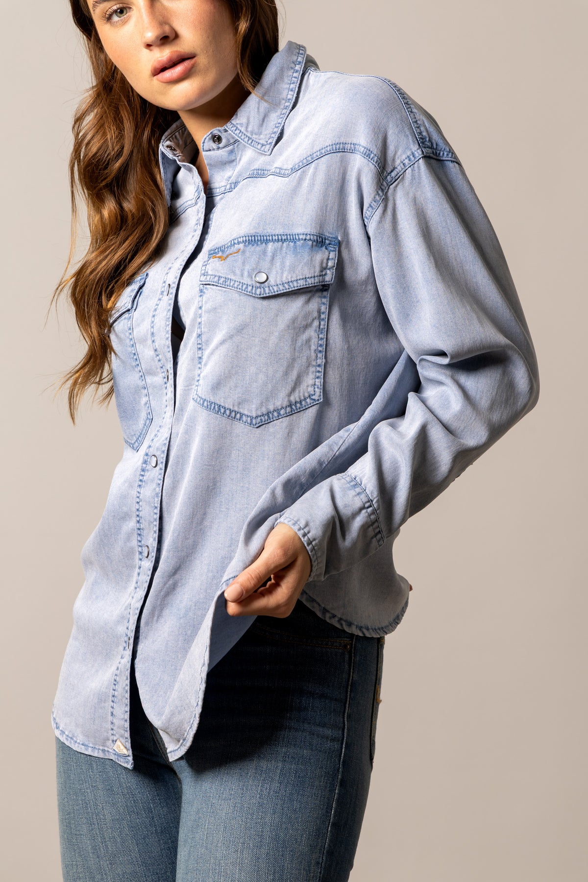 Kimes Ranch Olly jacket in Light Wash, side view, with front pockets and a button closure