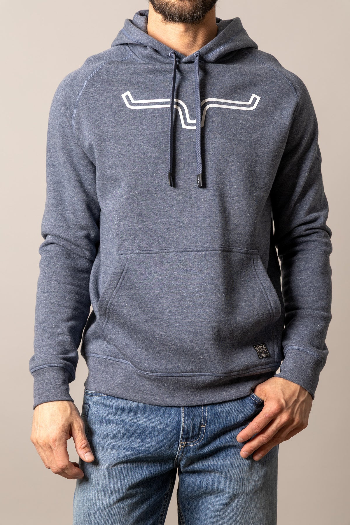 Kimes Ranch Outlier Hoodie in Blue Heather with a front kangaroo pocket and the Kimes Ranch logo on the chest