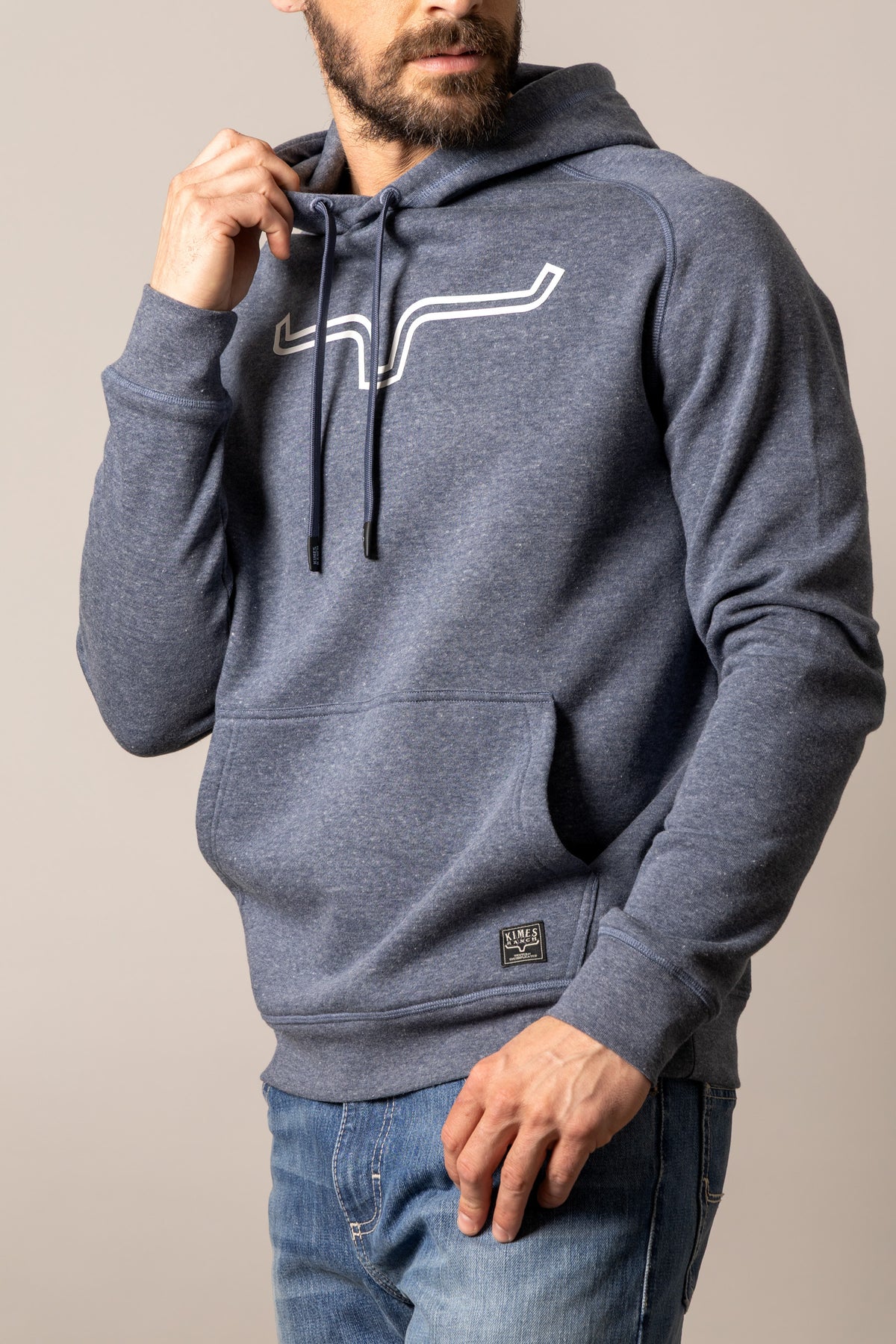 Kimes Ranch Outlier Hoodie in Blue Heather with a white logo on the chest and a front kangaroo pocket
