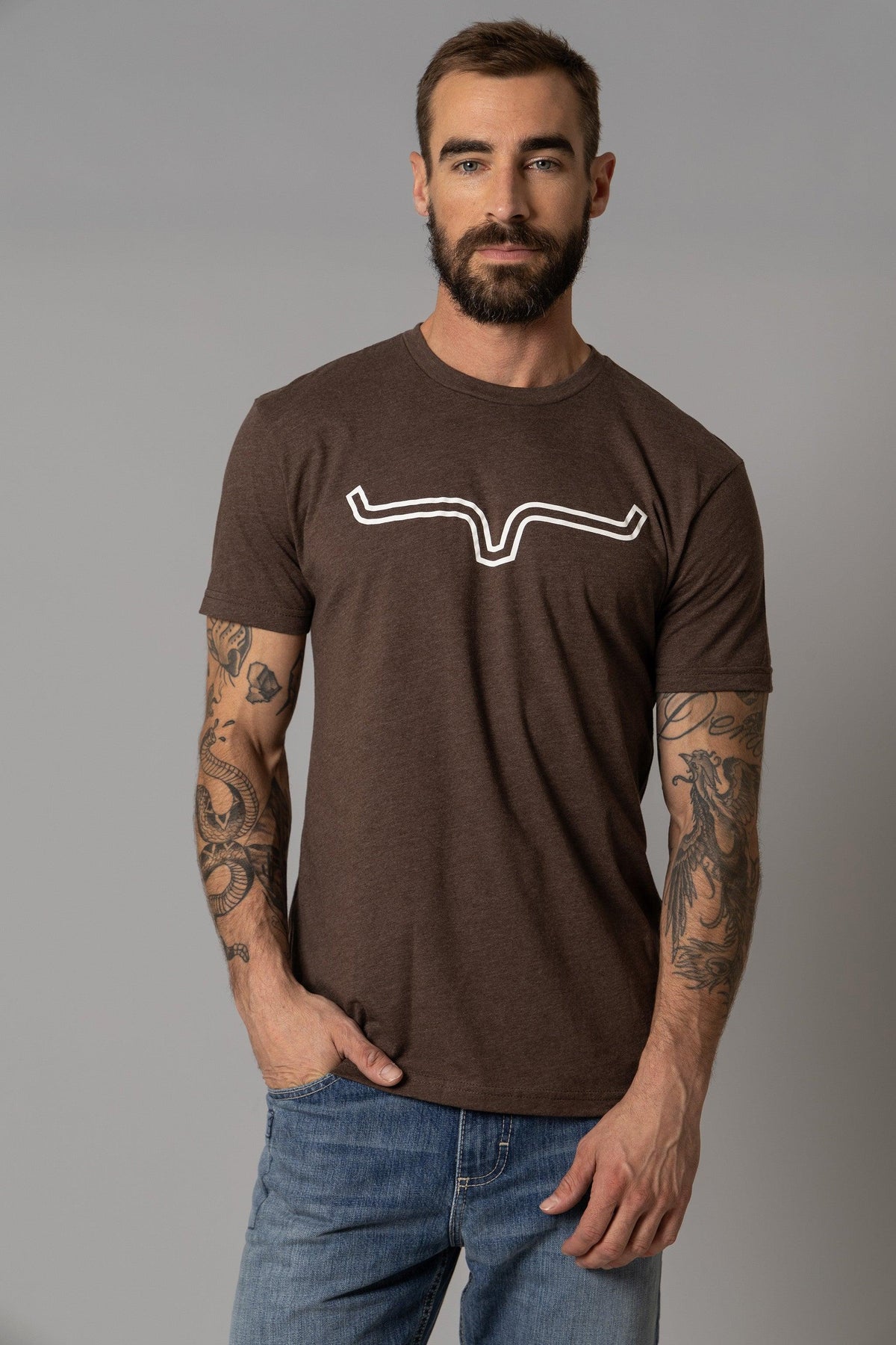 Kimes Ranch Outlier Shirt in Espresso with a white stylized steer logo on the chest