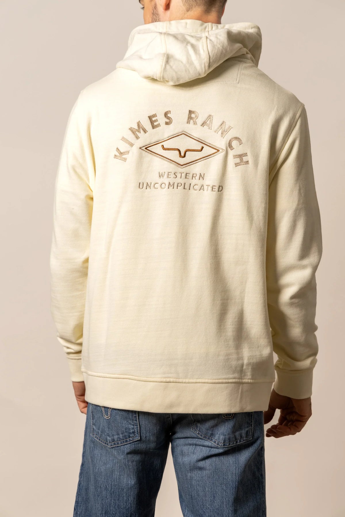 Kimes Ranch Overo Full Zip hoodie in Natural, back view, with back graphic and Western Uncomplicated text