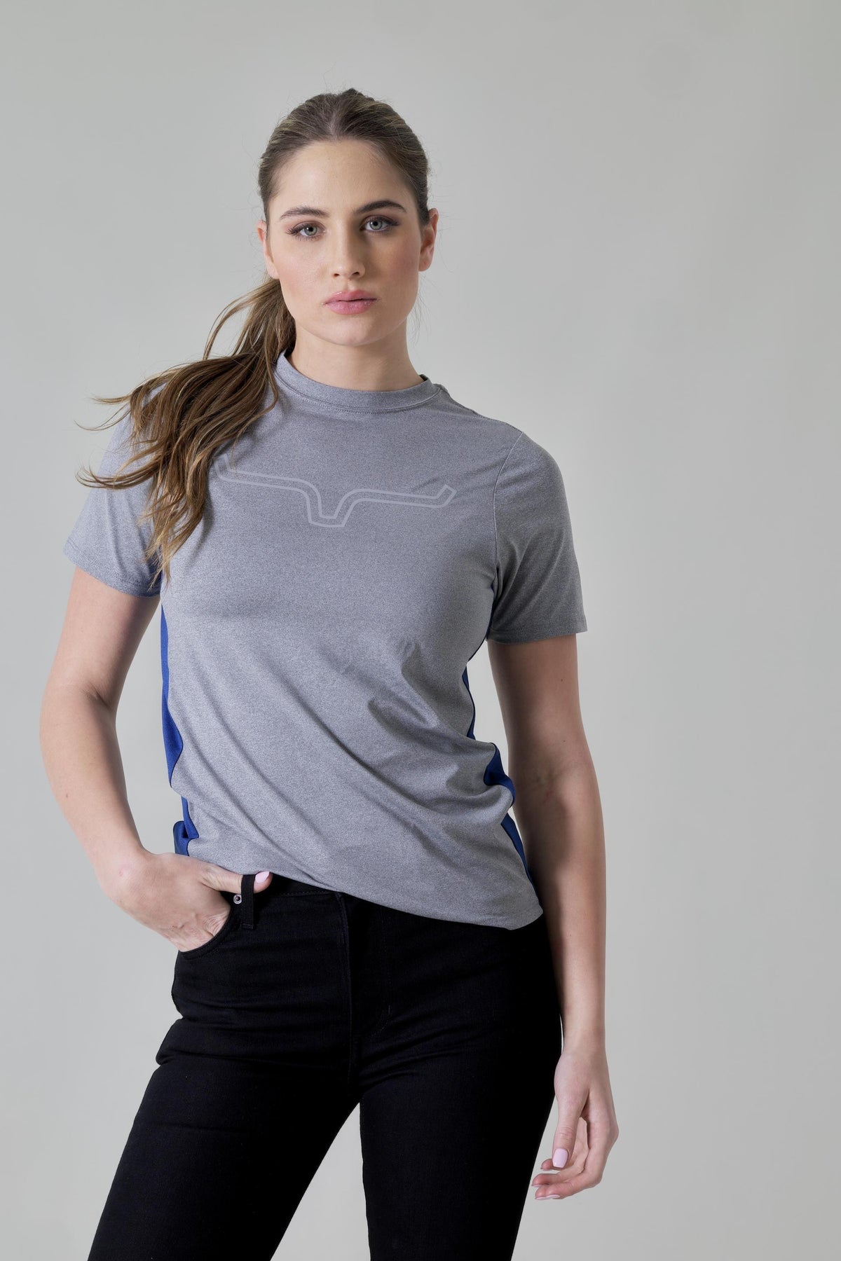 Kimes Ranch Ladies Phase 2 Tech Shirt in Grey Heather with a tonal logo and blue side panels