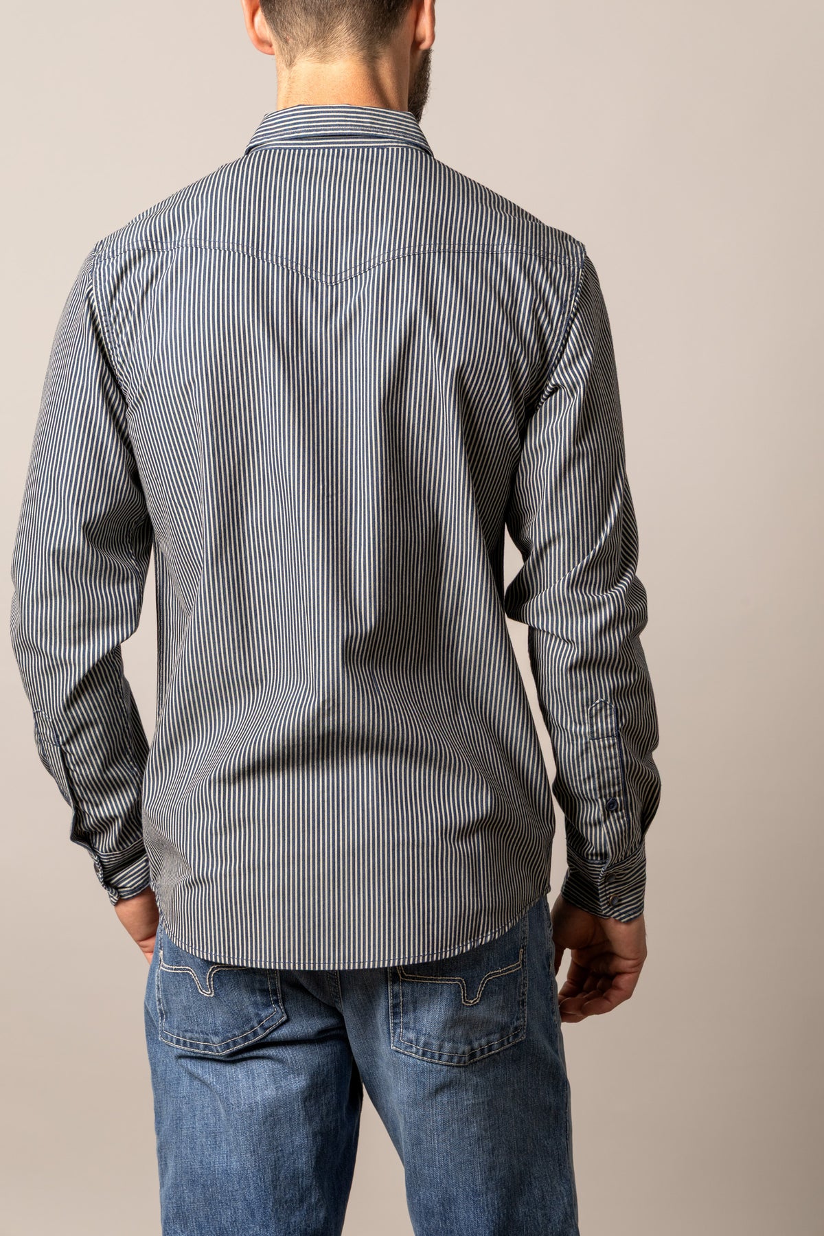 Kimes Ranch Quentin dress shirt in Indigo, back view, with vertical stripes and a back yoke